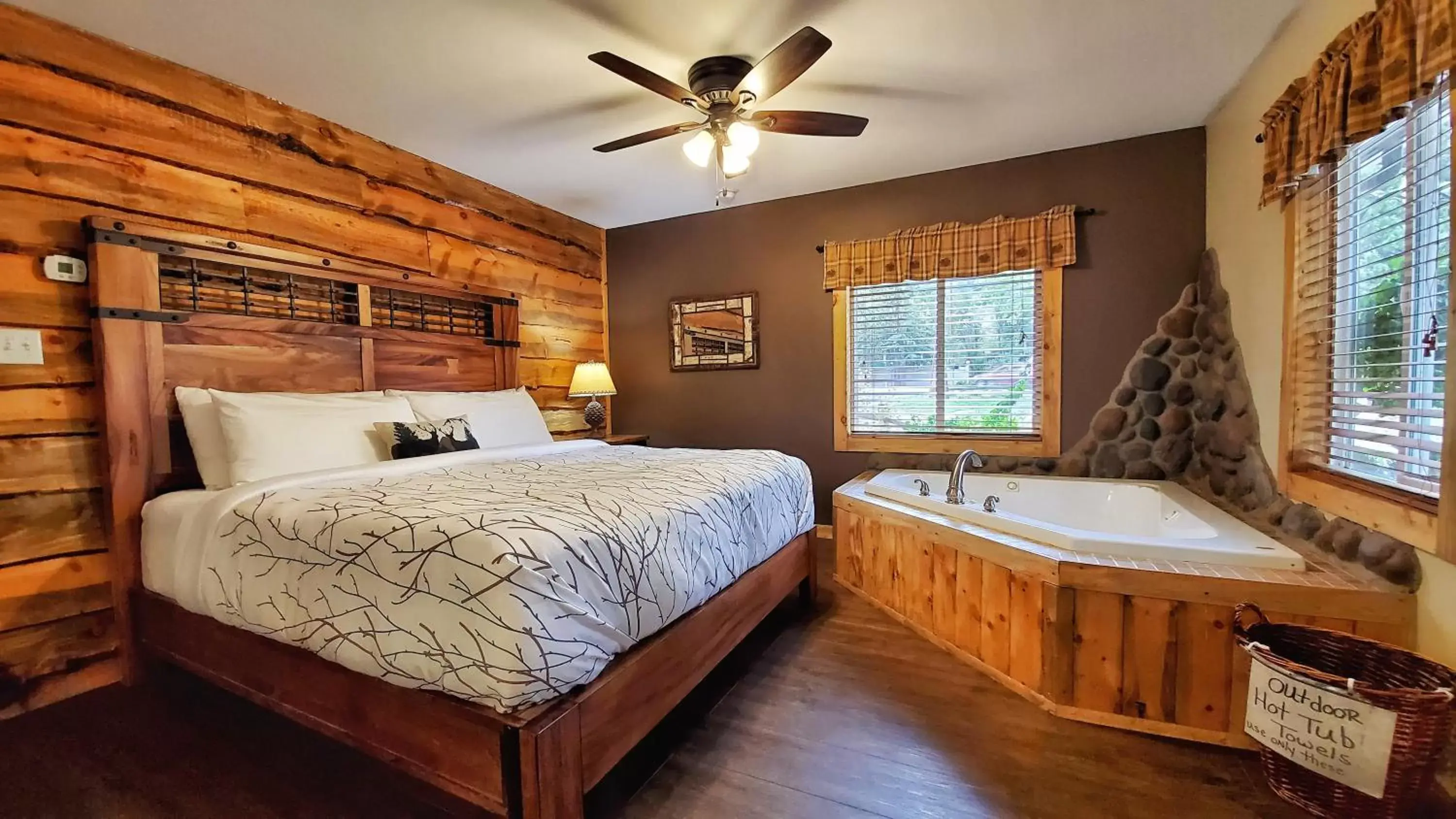 Bed in The Inn on Fall River & Fall River Cabins