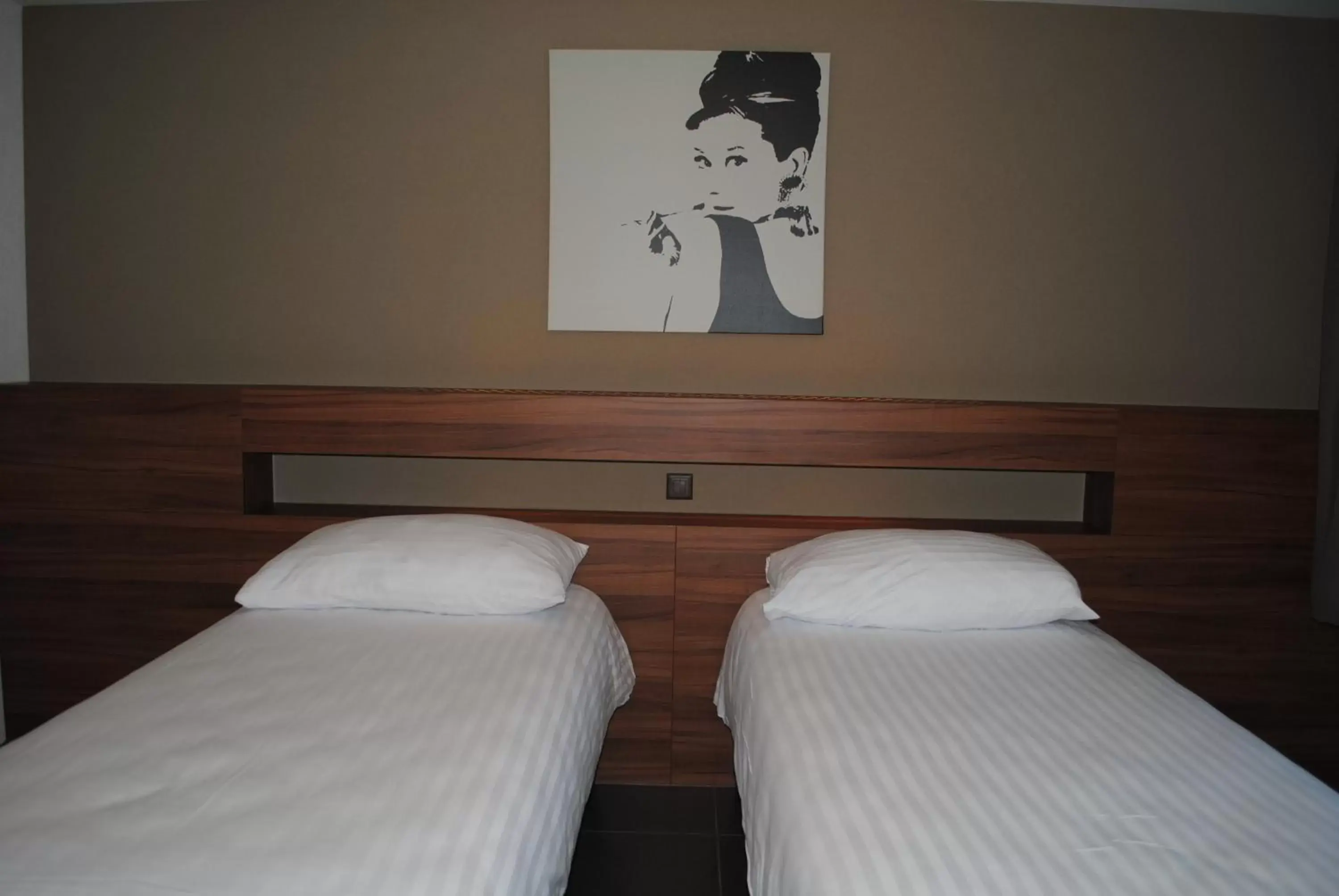 Bed in Hotel Du Soleil