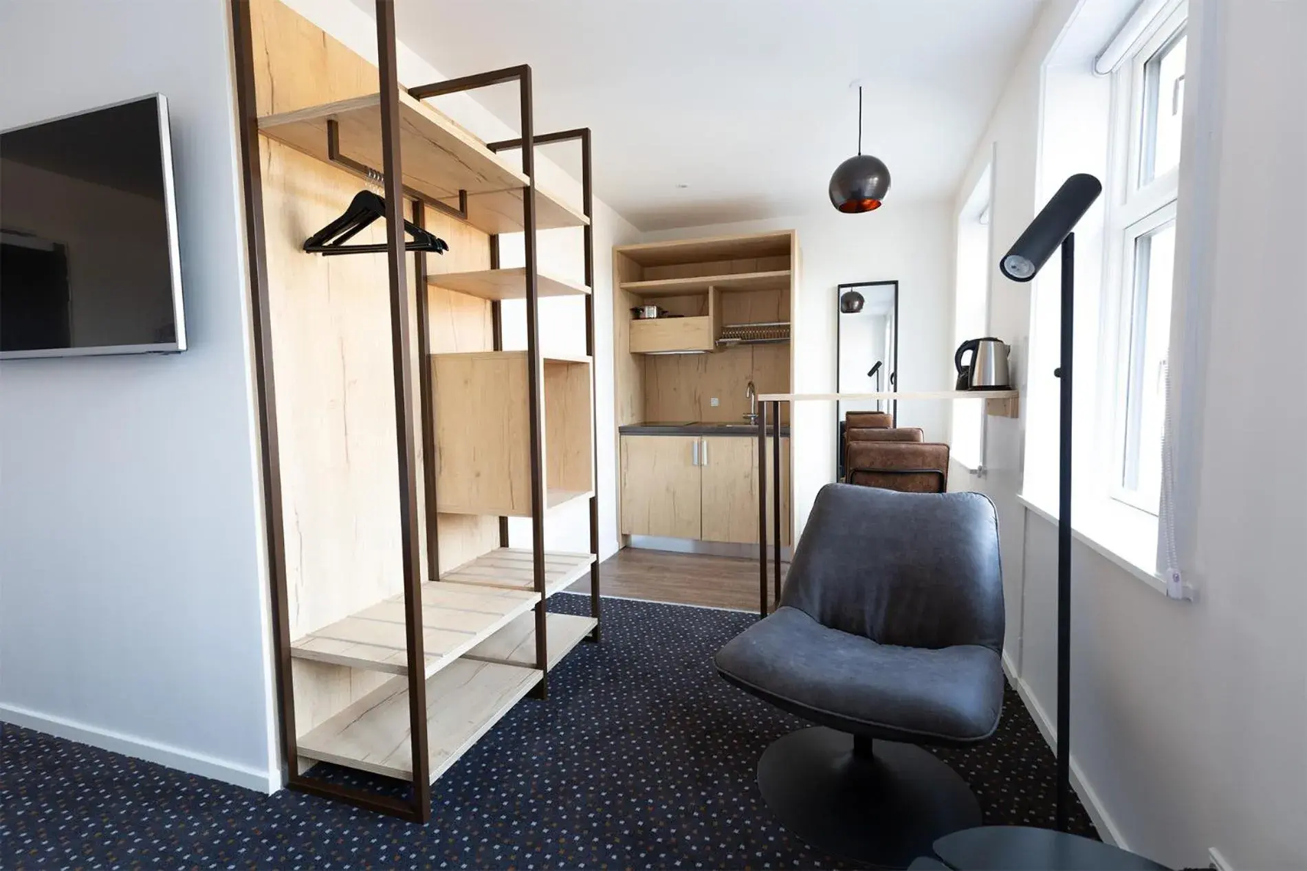 Bedroom, Seating Area in Hotel Garni