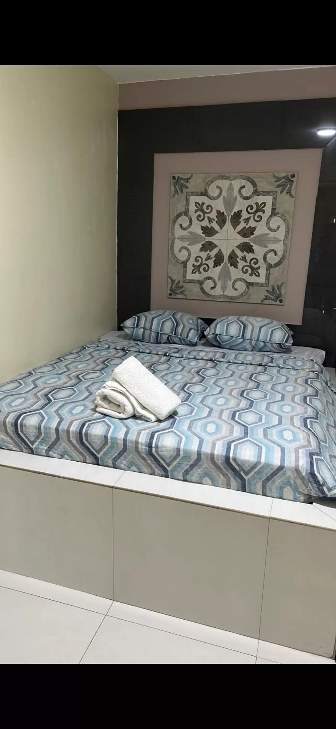 Bed in Curasita colour Appartments