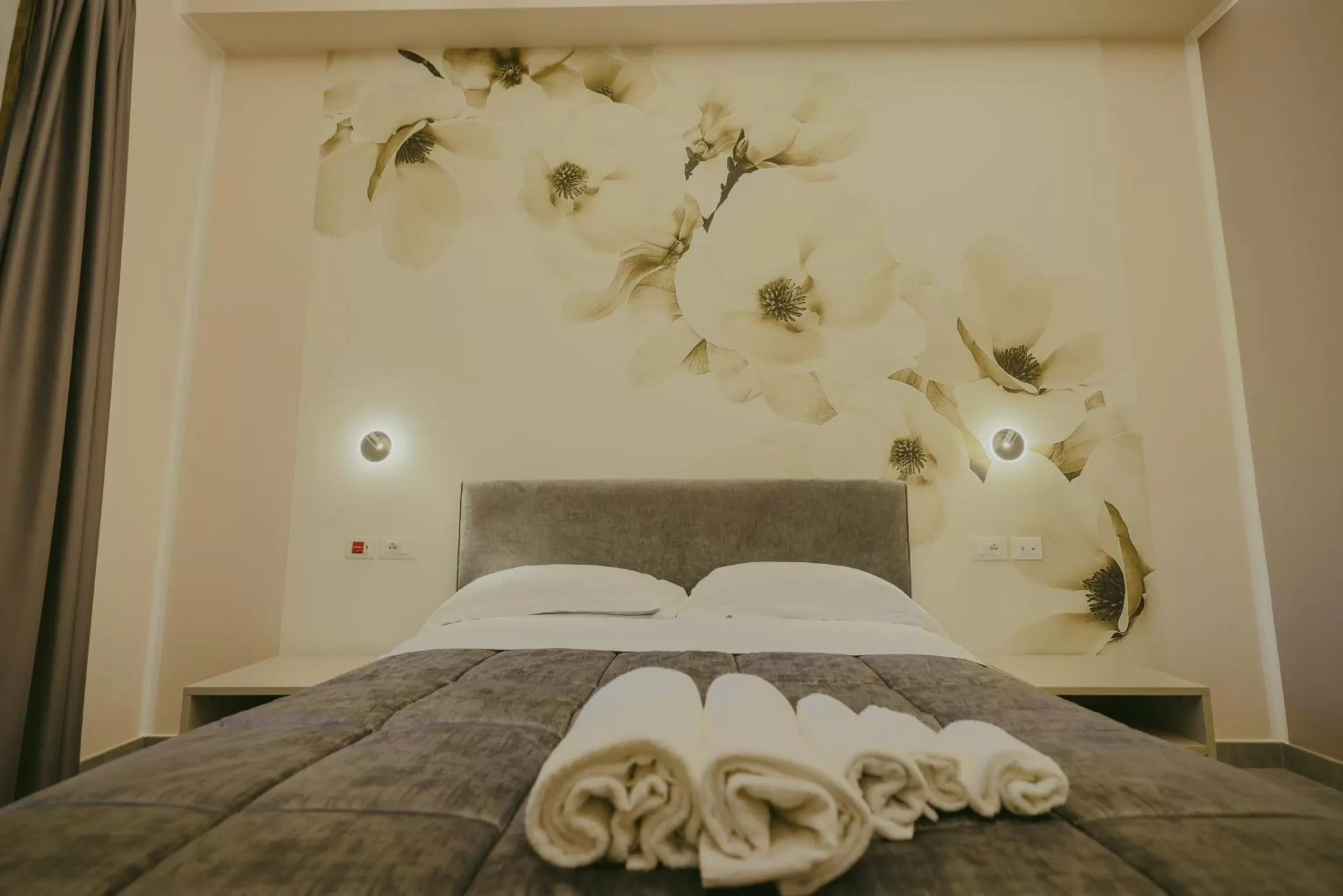 Bed in Brettia Guest Rooms