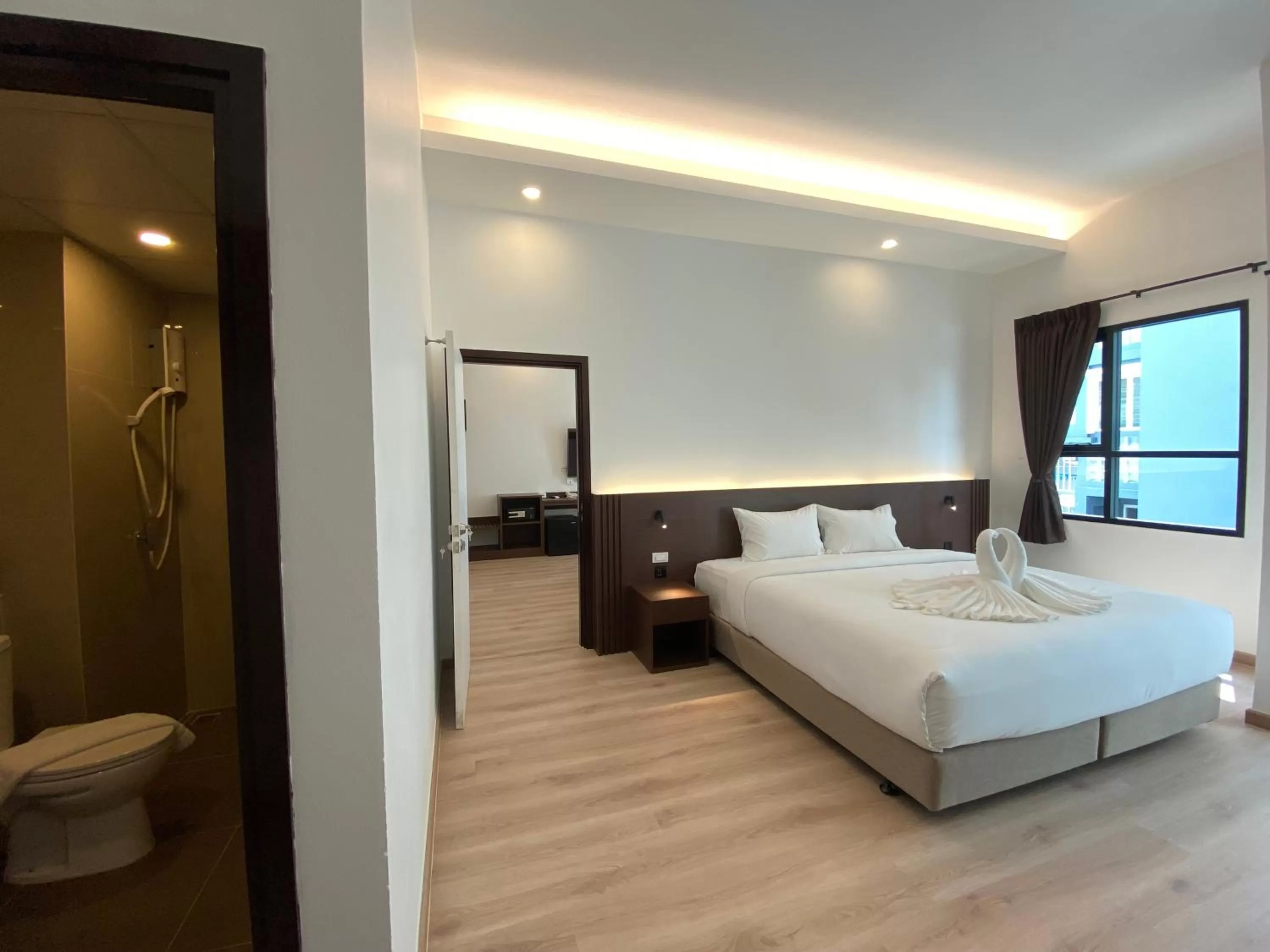 Bed in GEEN Hotel Chonburi