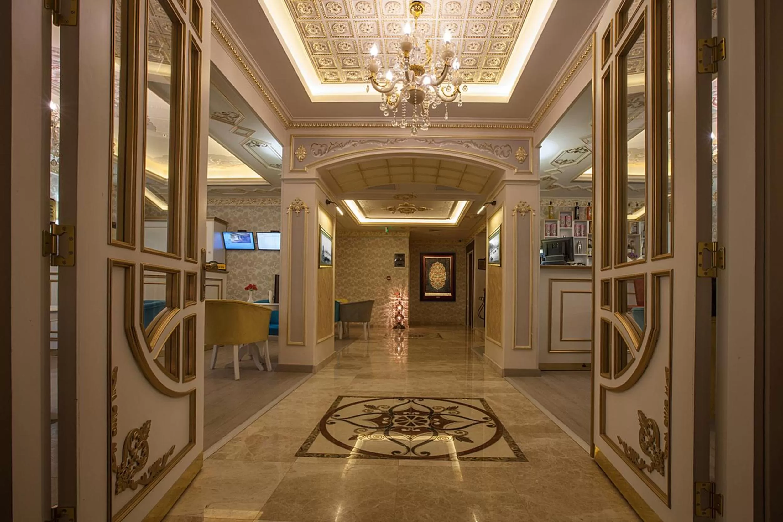 Lobby or reception in Empire Suite Hotel