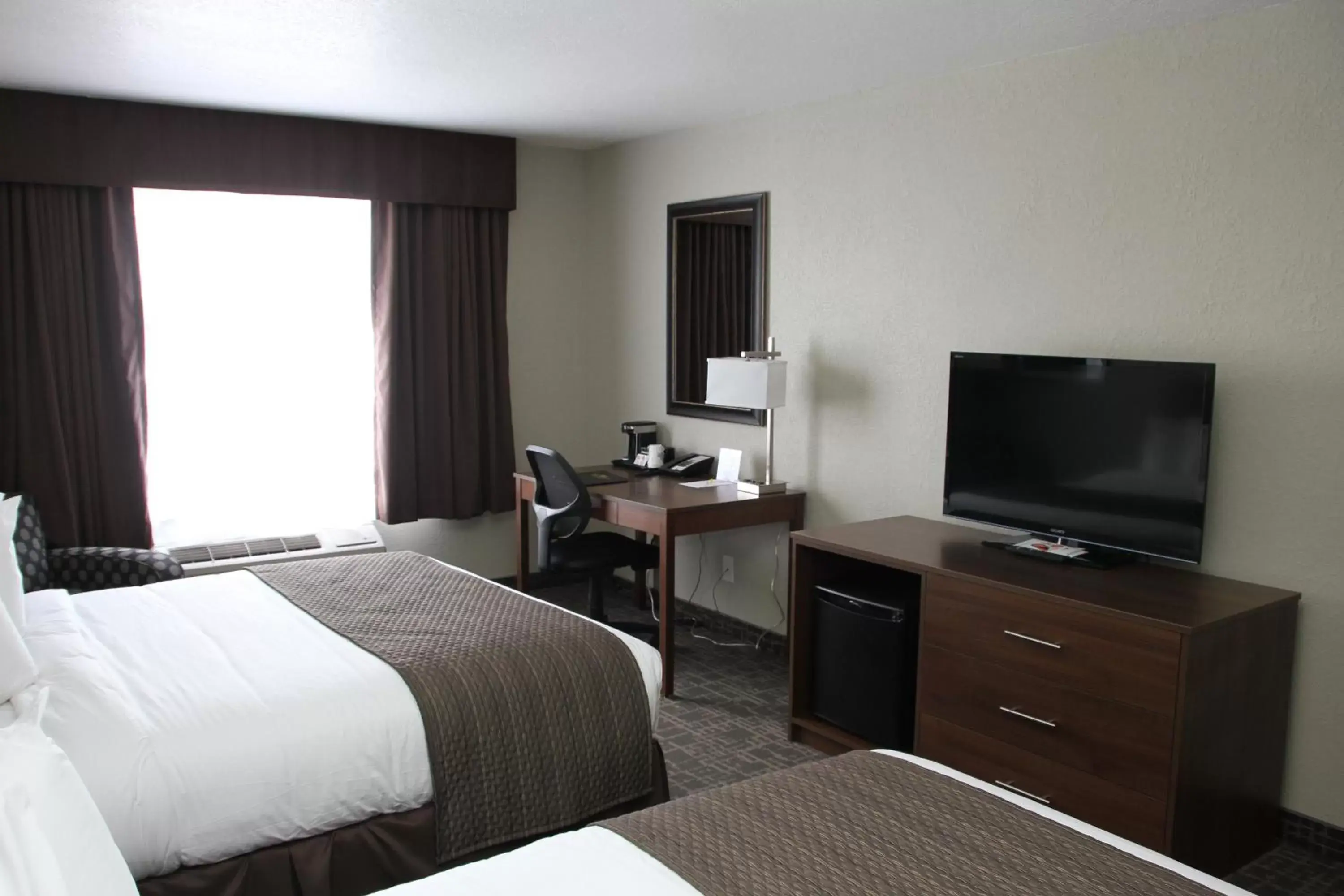 Photo of the whole room, TV/Entertainment Center in Days Inn & Suites by Wyndham Yorkton