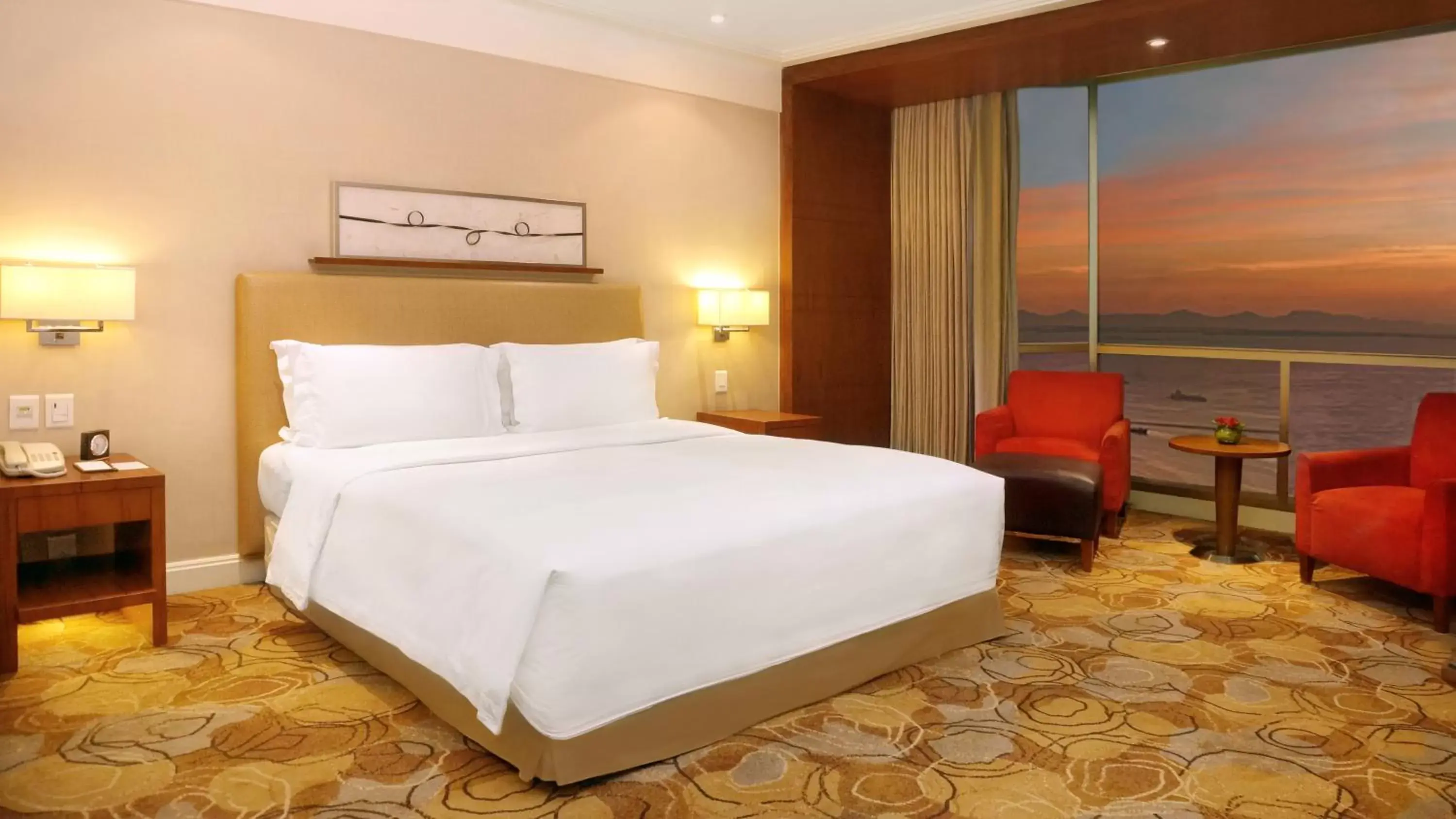 Bed in New Coast Hotel Manila (formerly New World Manila Bay Hotel)