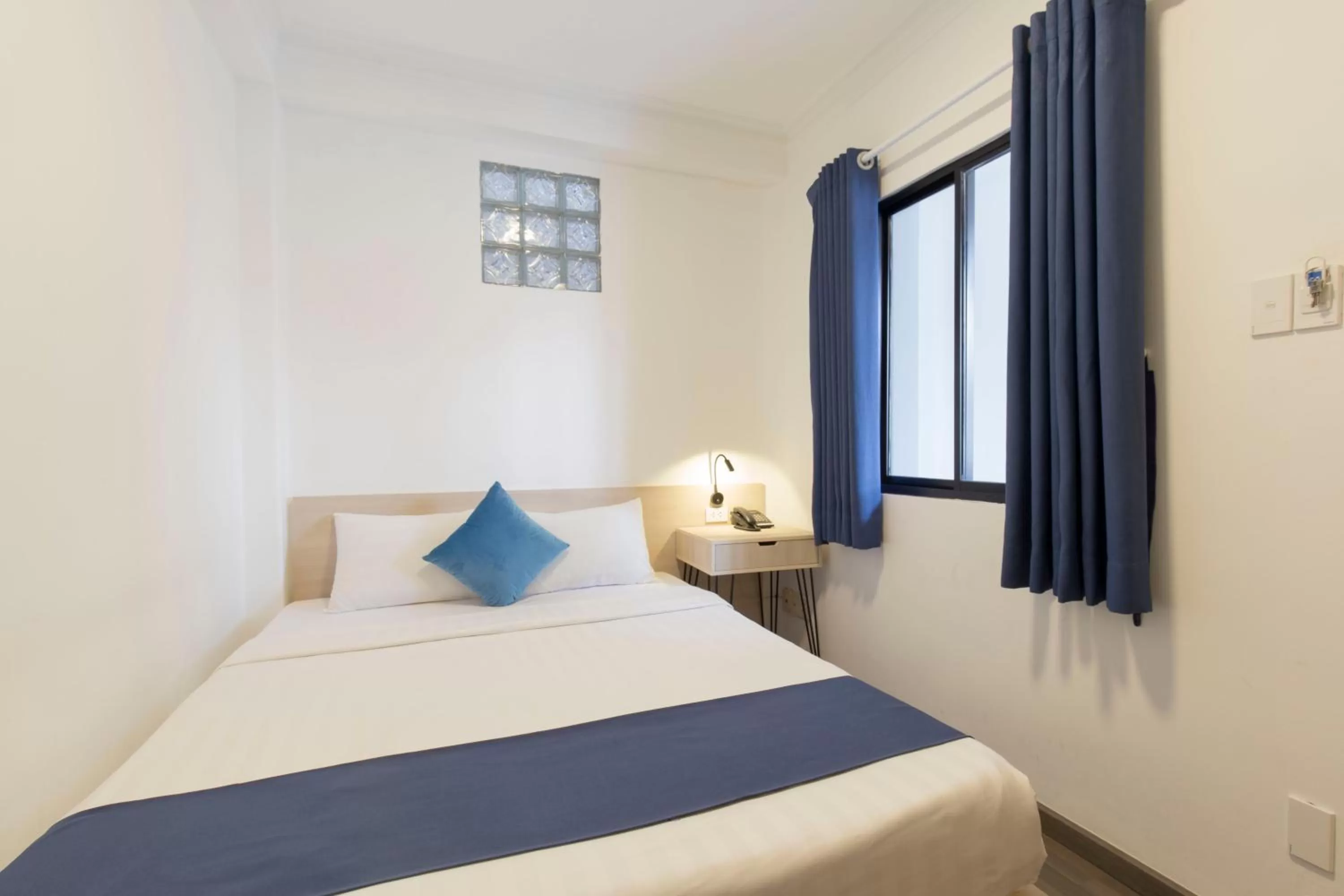 Bed in Spotlight Hotel