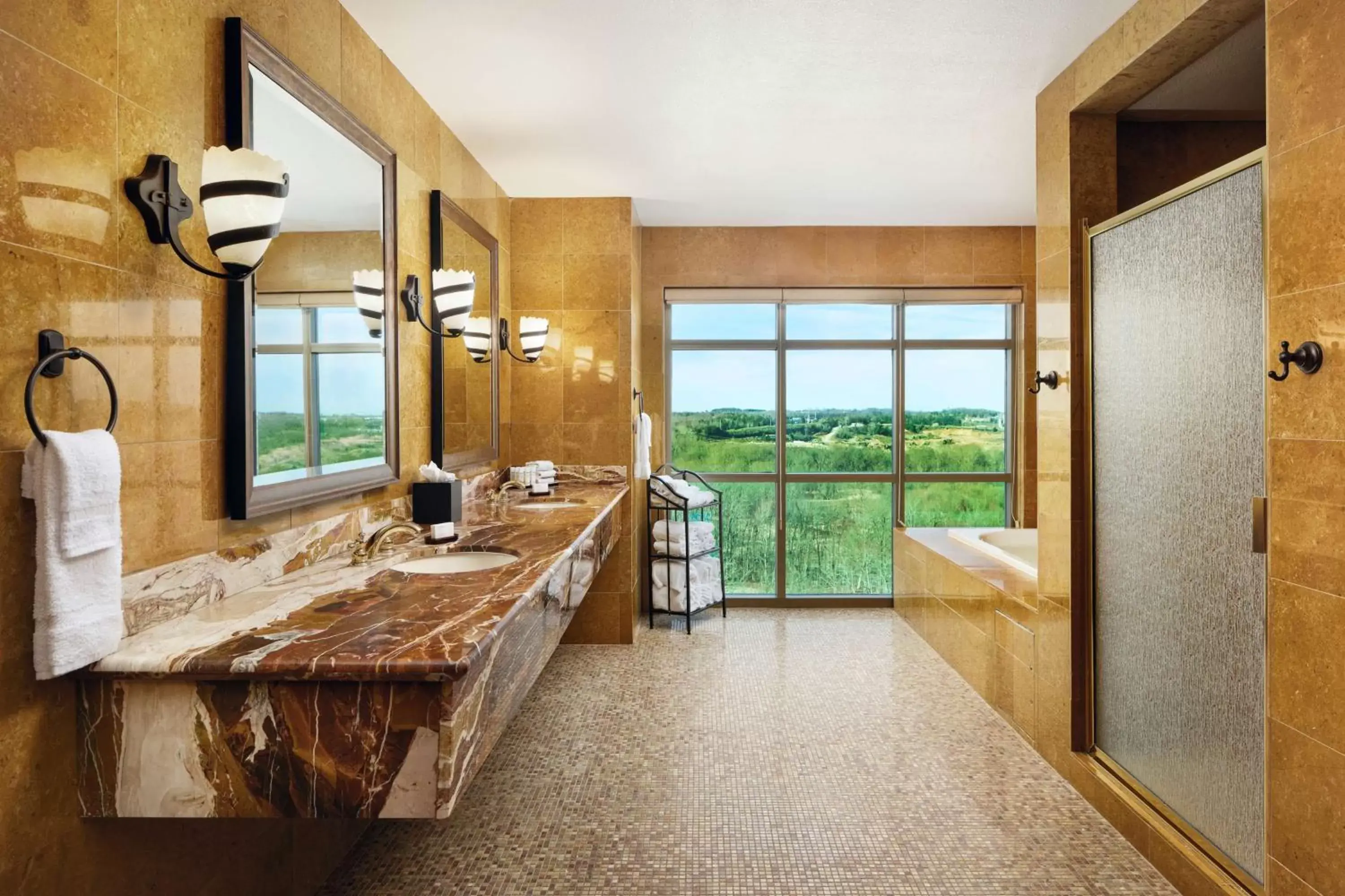 Bathroom in Embassy Suites by Hilton Charlotte Concord Golf Resort & Spa