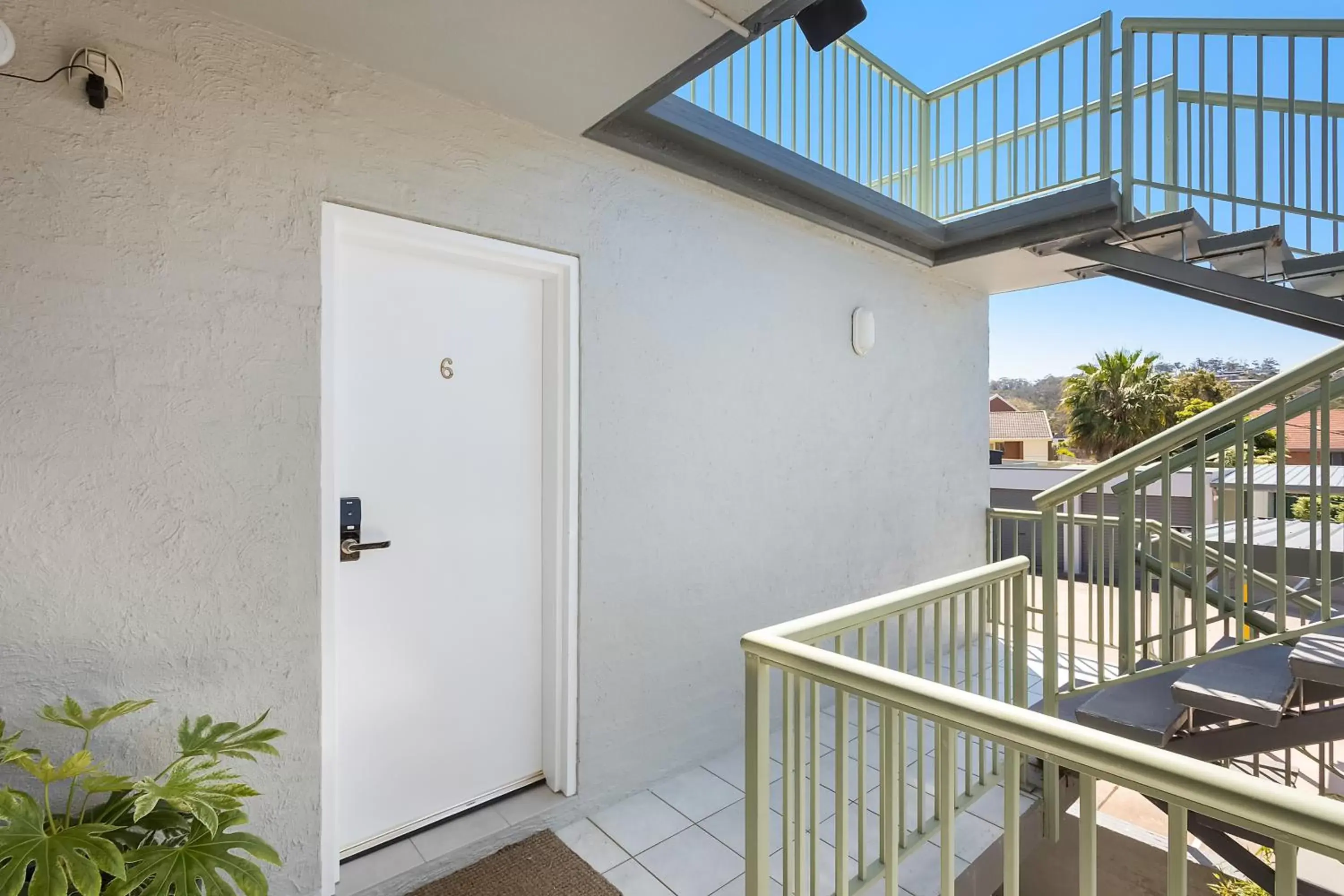 Facade/entrance, Balcony/Terrace in The Palms Apartments