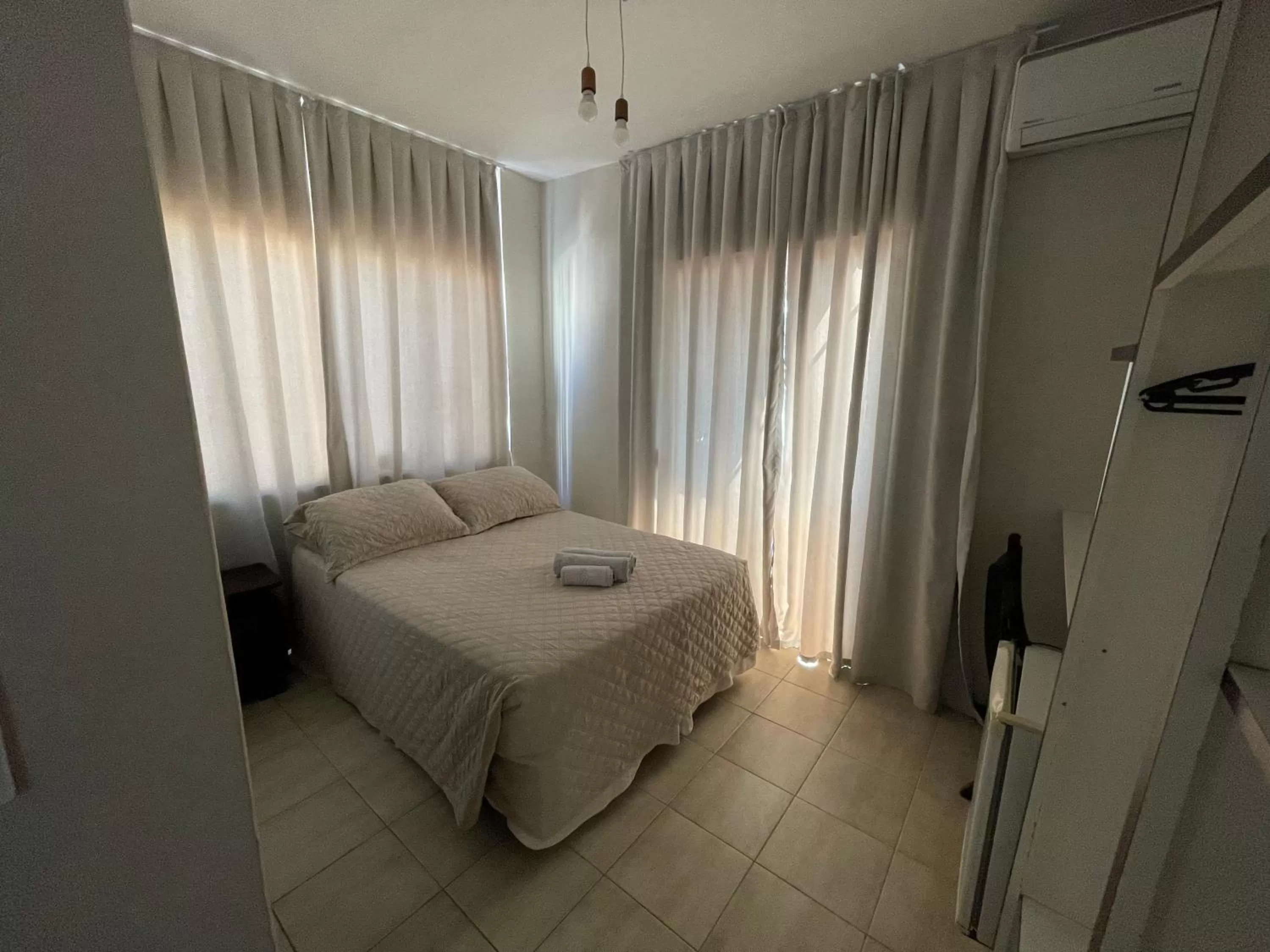 Bed in Shallom Hotel