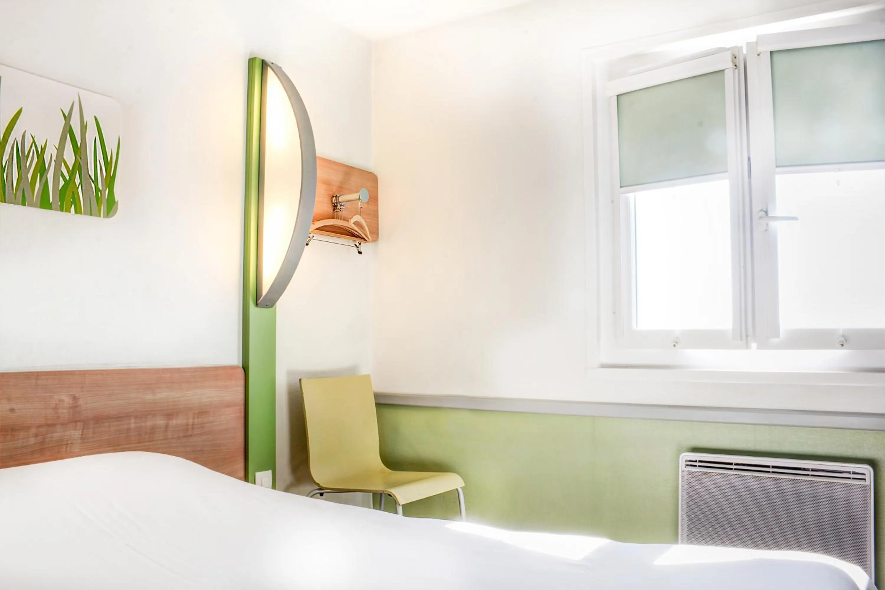 Bed in Hotel Inn Design Issoudun