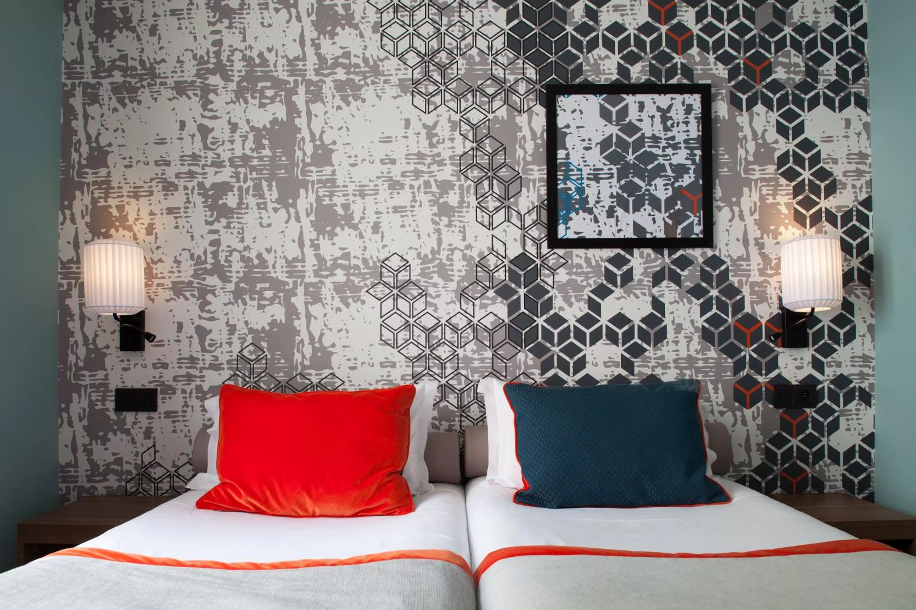 Bed in Hotel des Nations Saint Germain