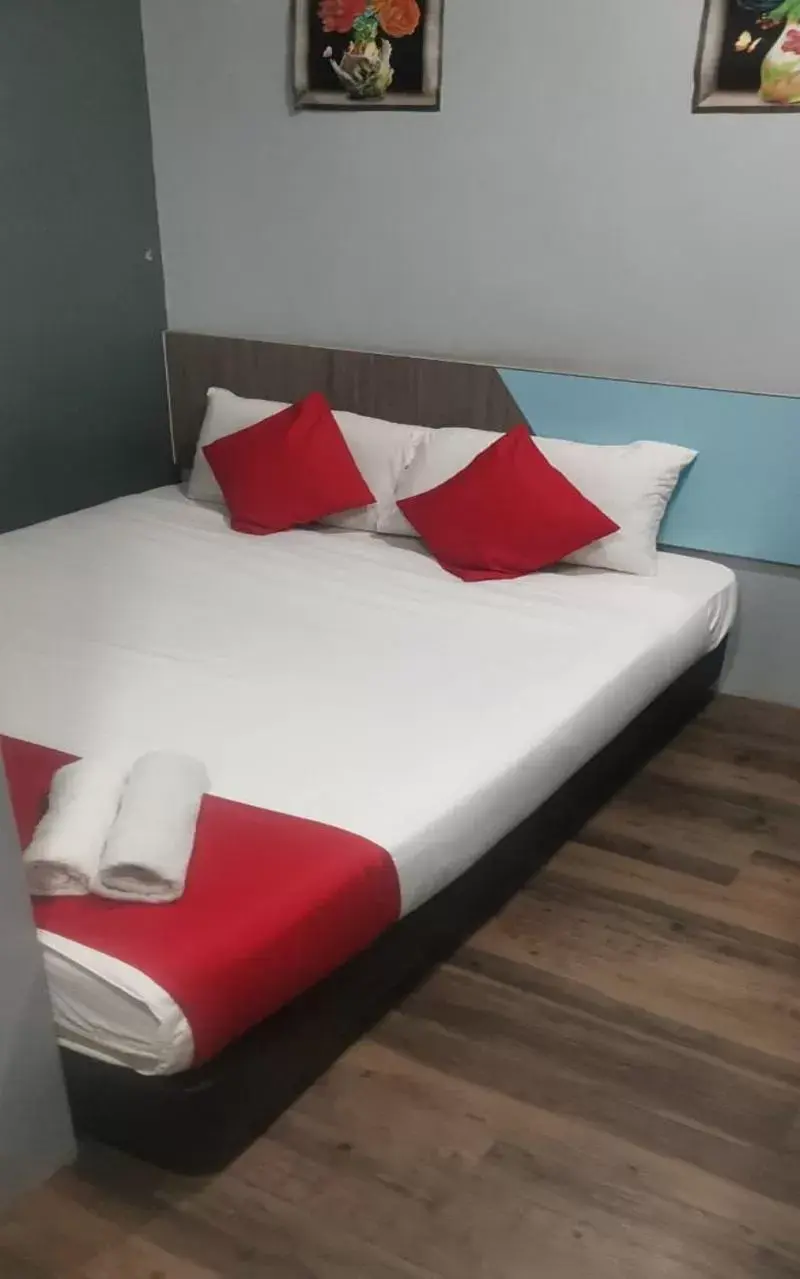 Bed in Lucky Hotel