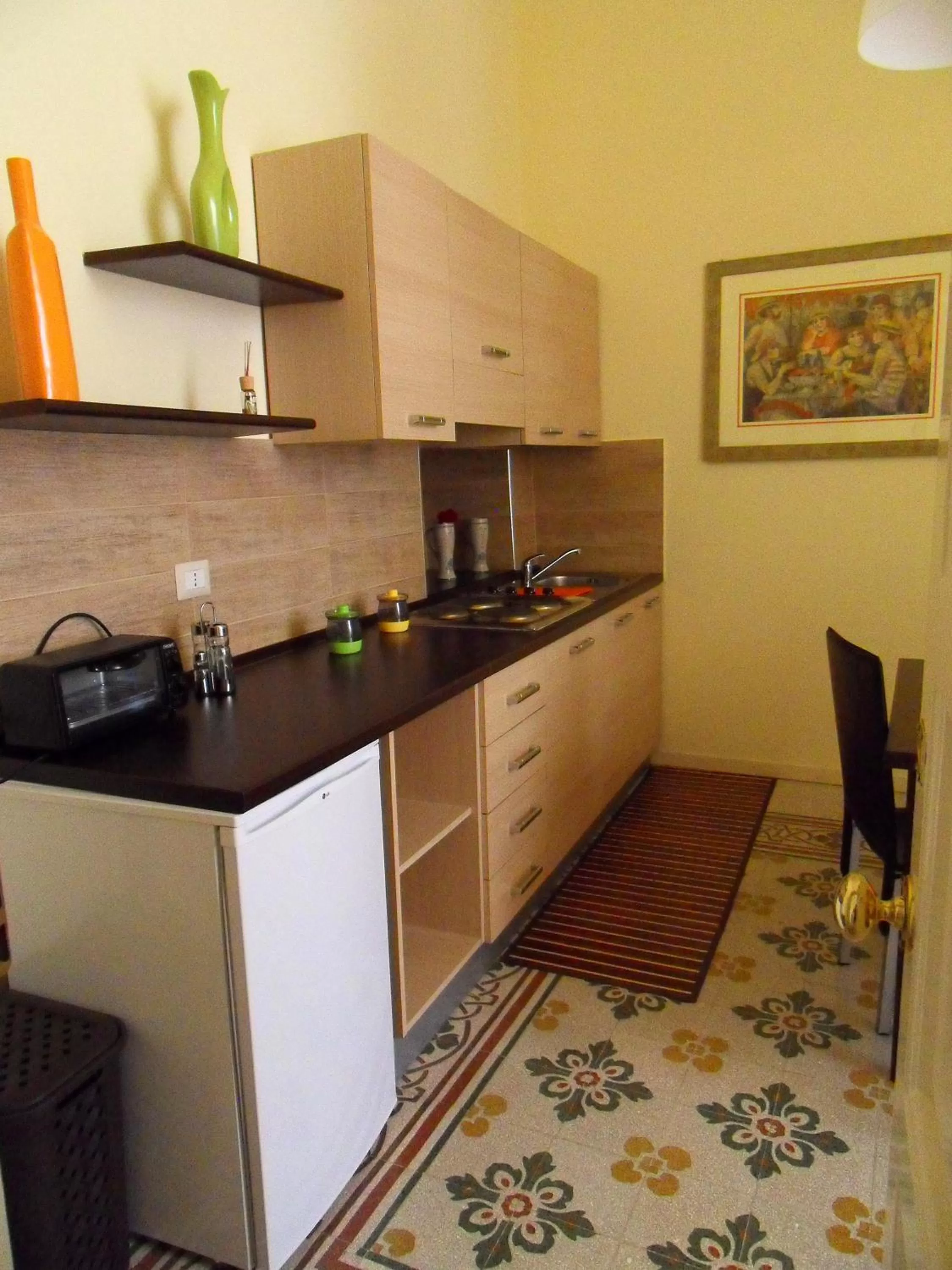 Kitchen or kitchenette in Albergo Diffuso Dimora Rossi B&B