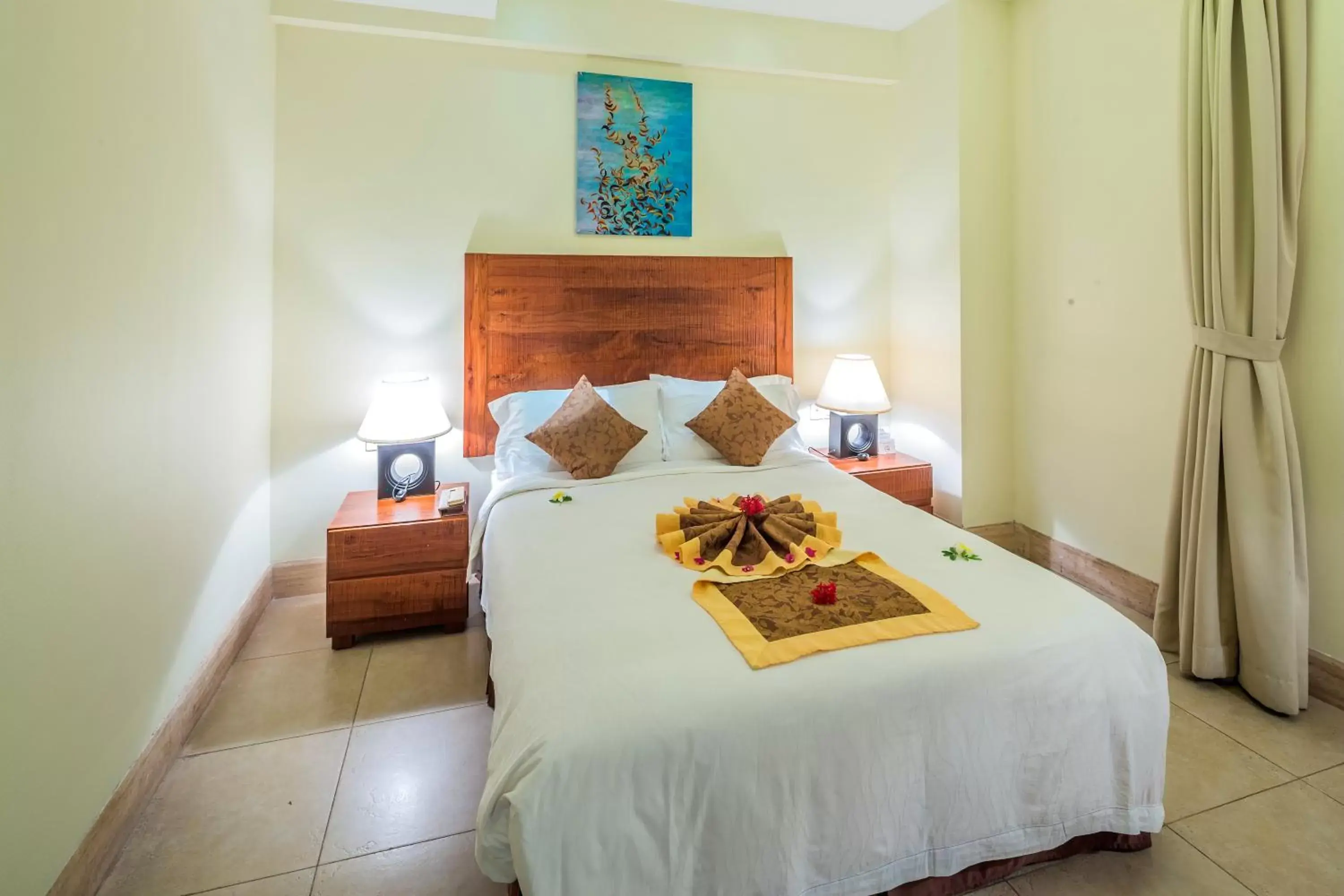 Bed in Aegean Suites Sanya Yalong Bay Resort
