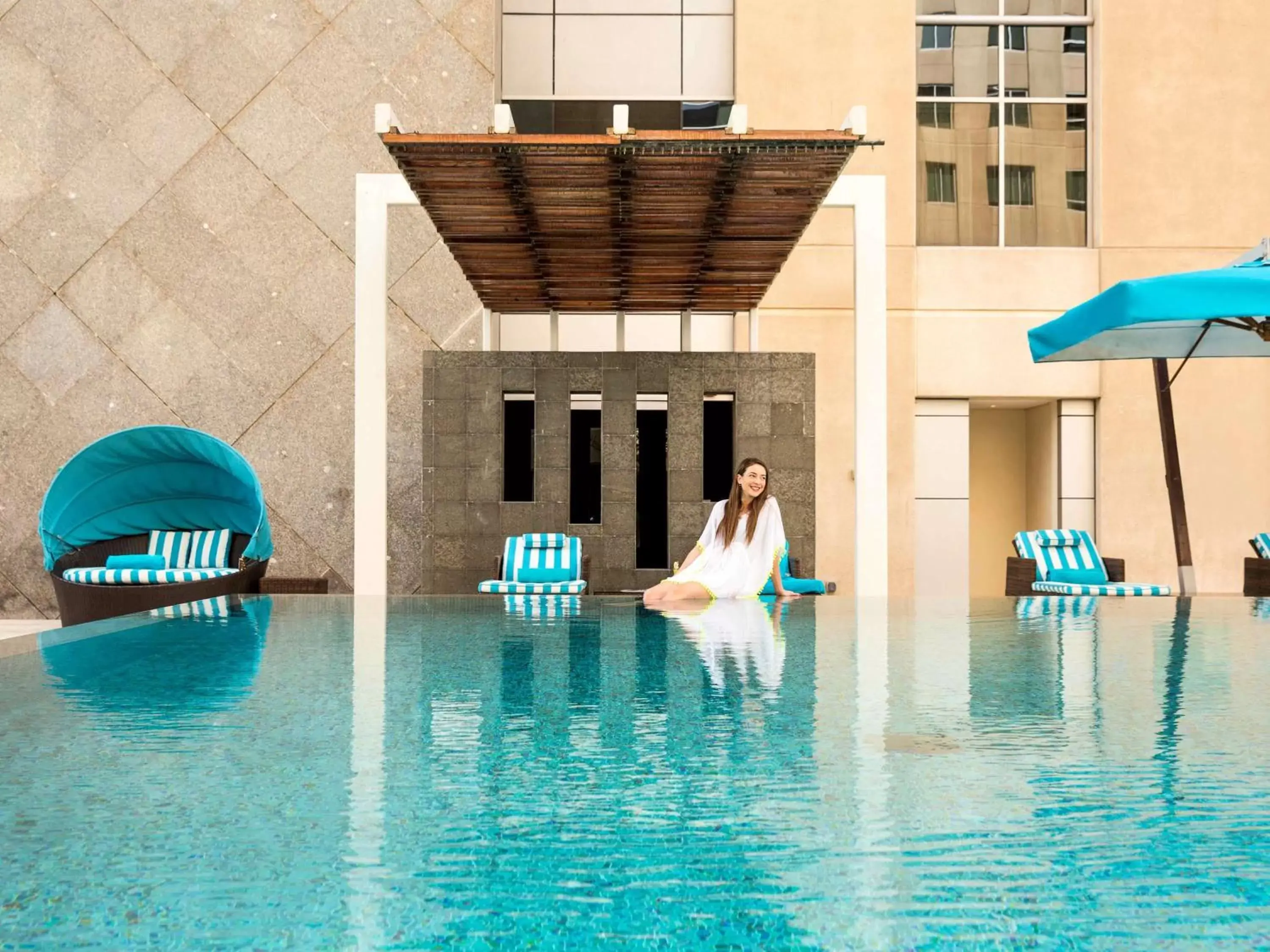 Lounge or bar, Swimming Pool in Novotel Deira City Centre