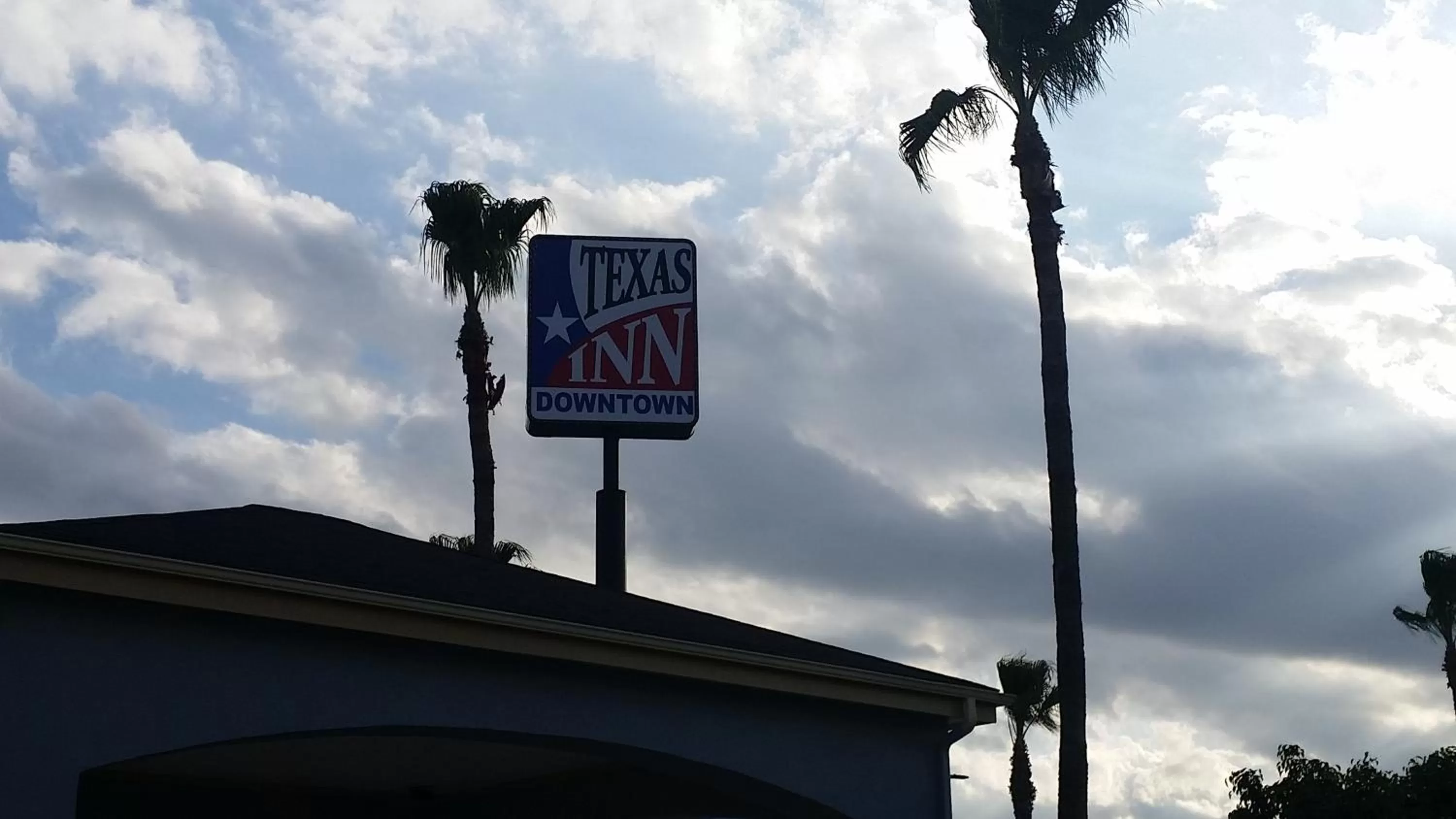 Property logo or sign in Texas Inn Downtown McAllen