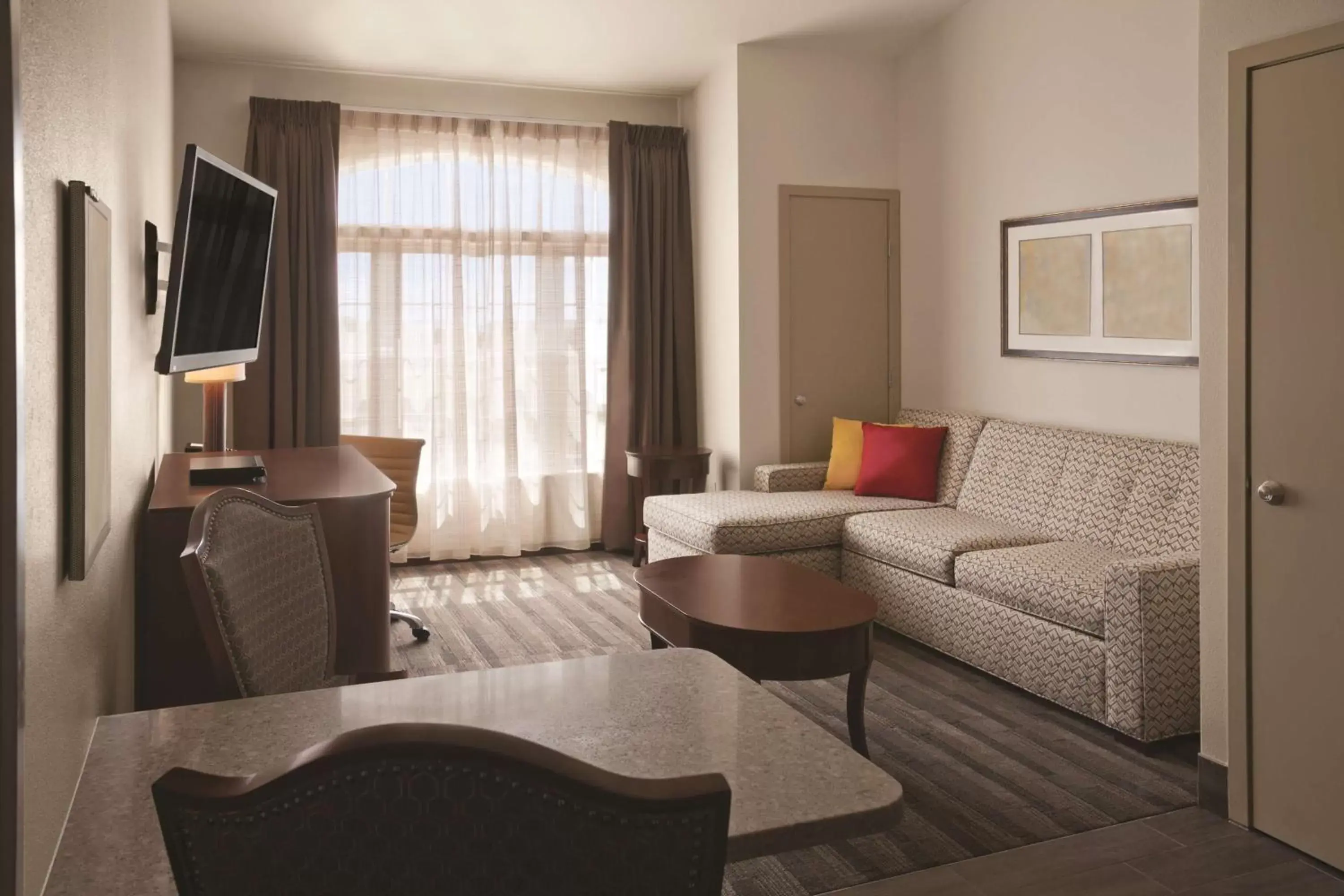 Photo of the whole room, Seating Area in Hyatt House Minot- North Dakota