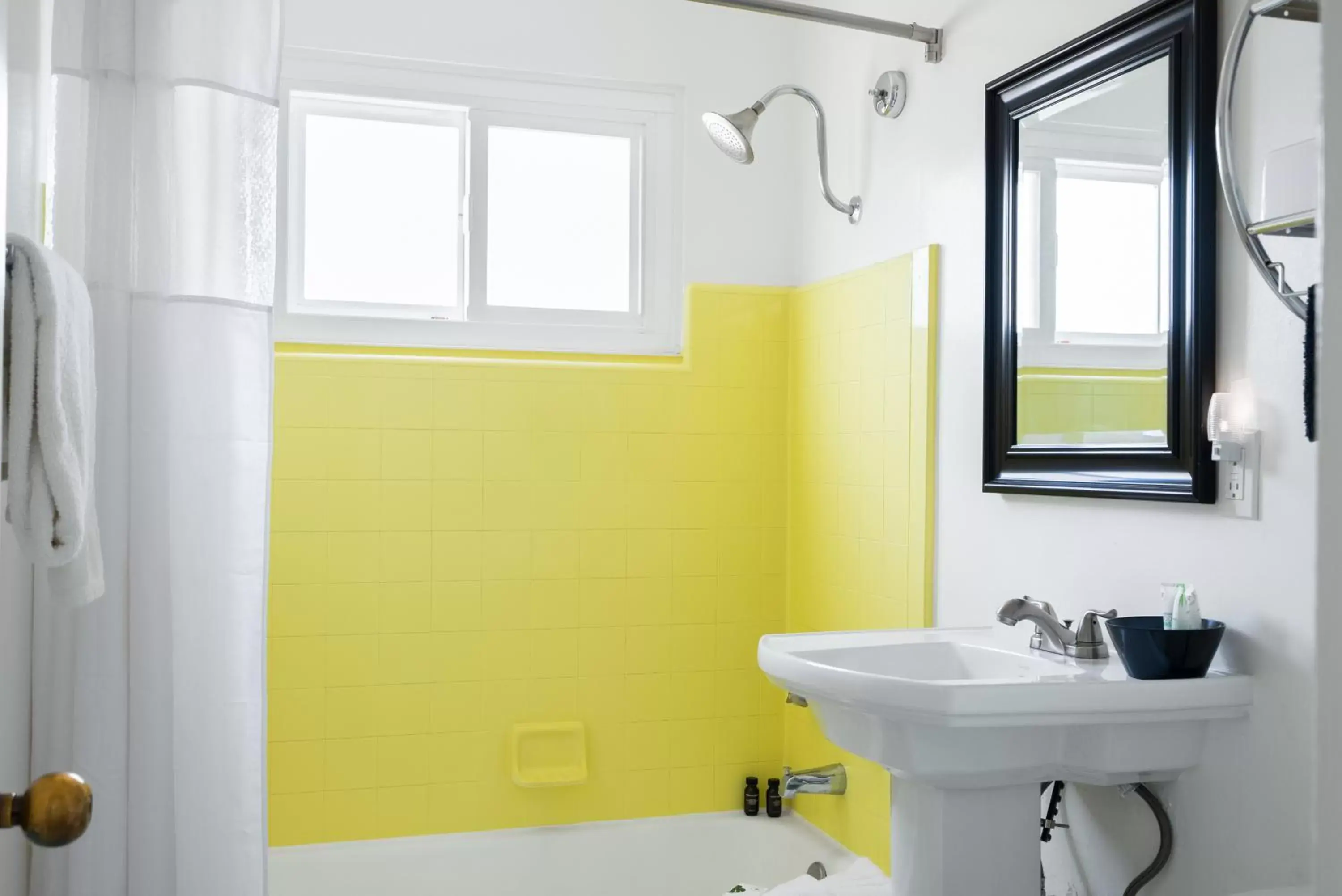 Bathroom in The Monkey Tree Hotel by AvantStay