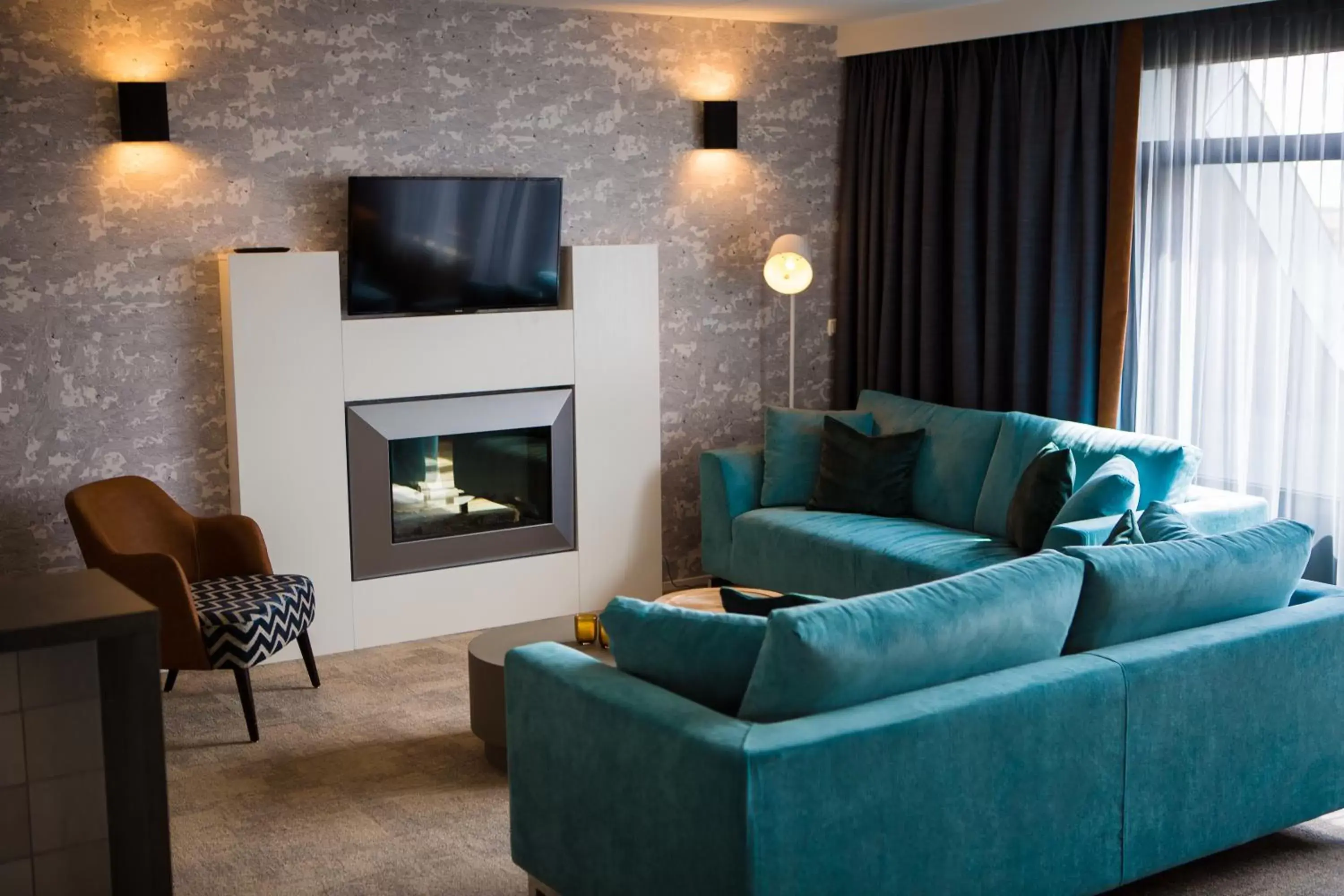 Communal lounge/ TV room, Seating Area in Paal 8 Hotel aan Zee