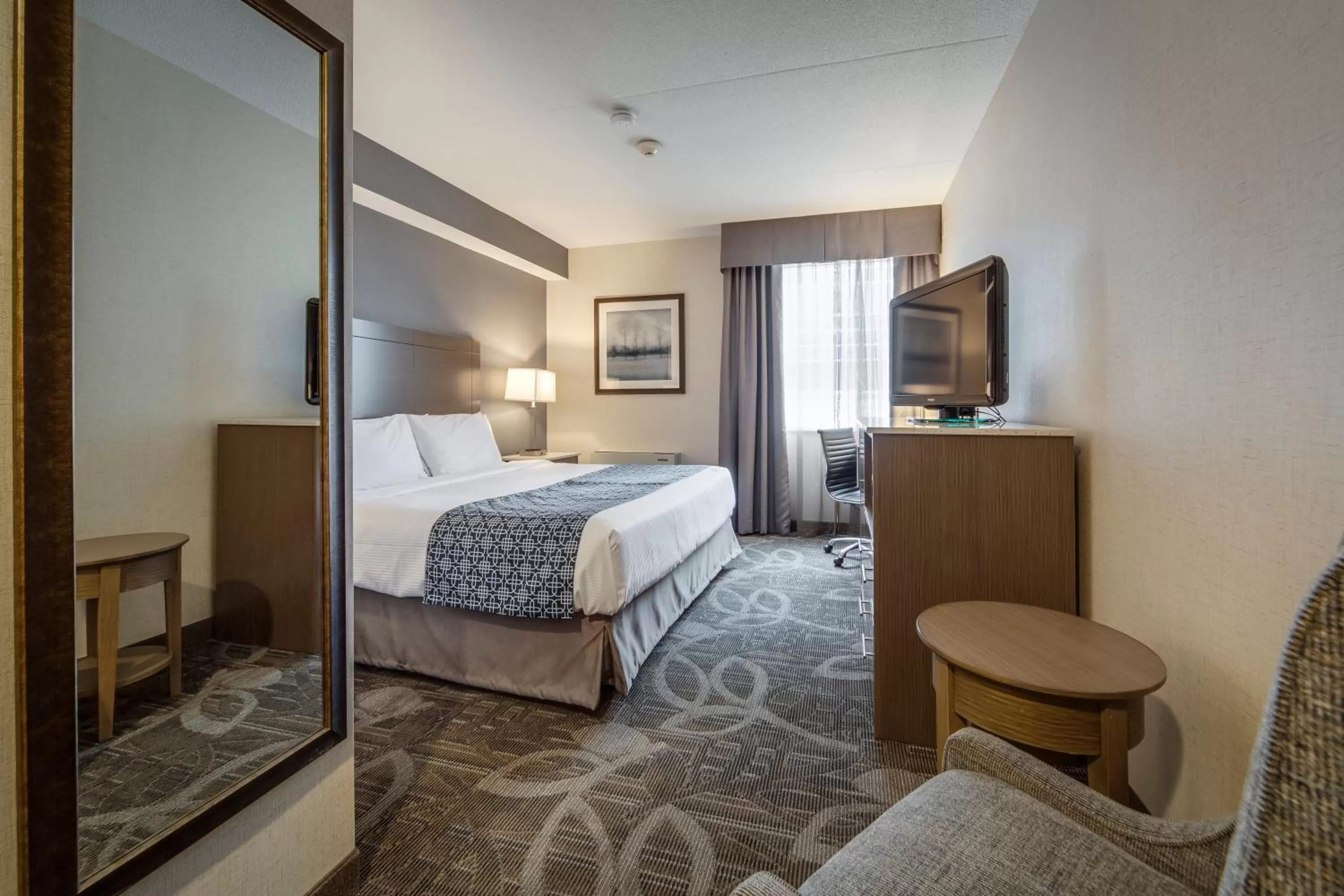 Photo of the whole room, Bed in Monte Carlo Inn Airport Suites