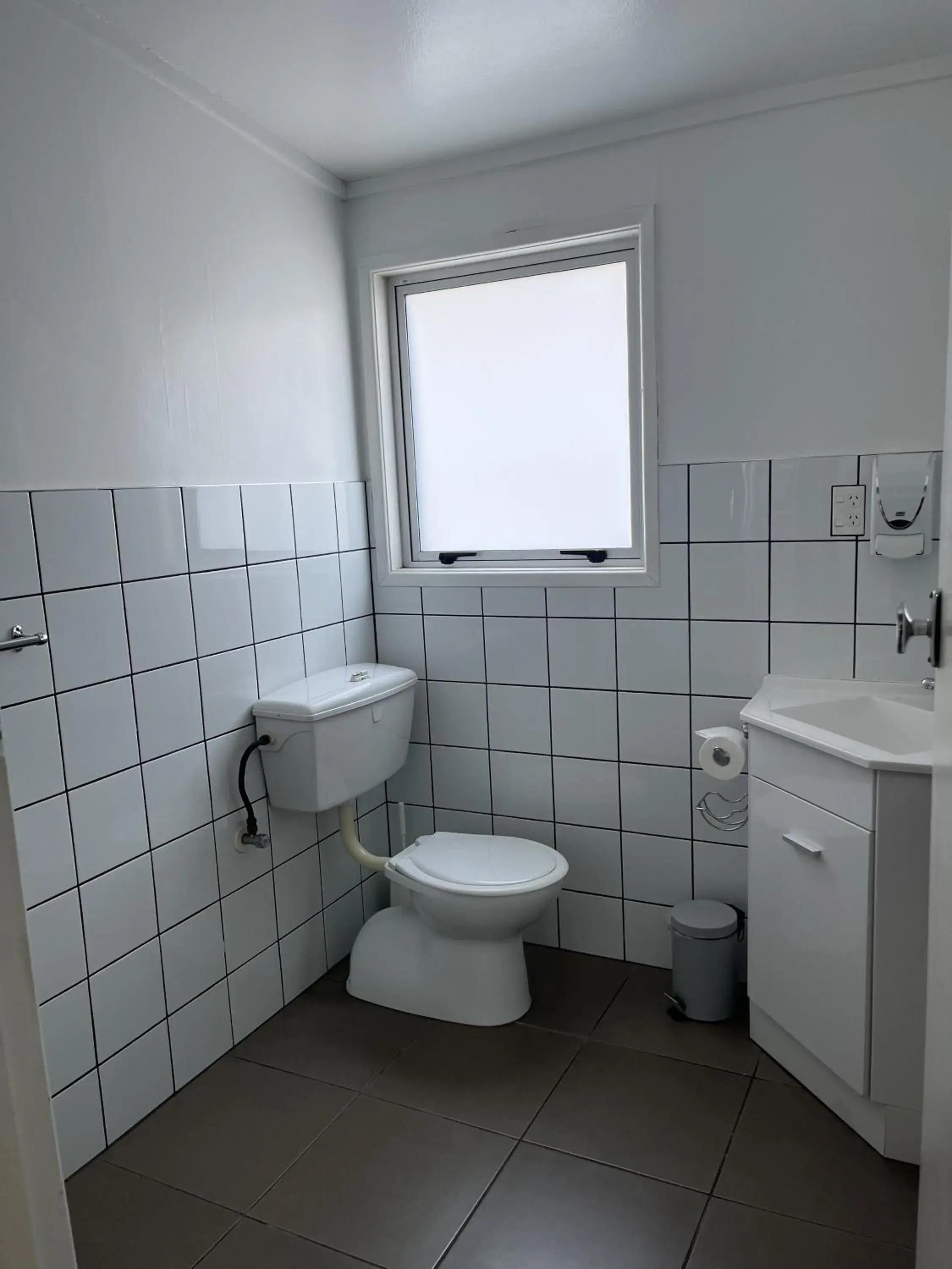 Bathroom in Central Court Motel