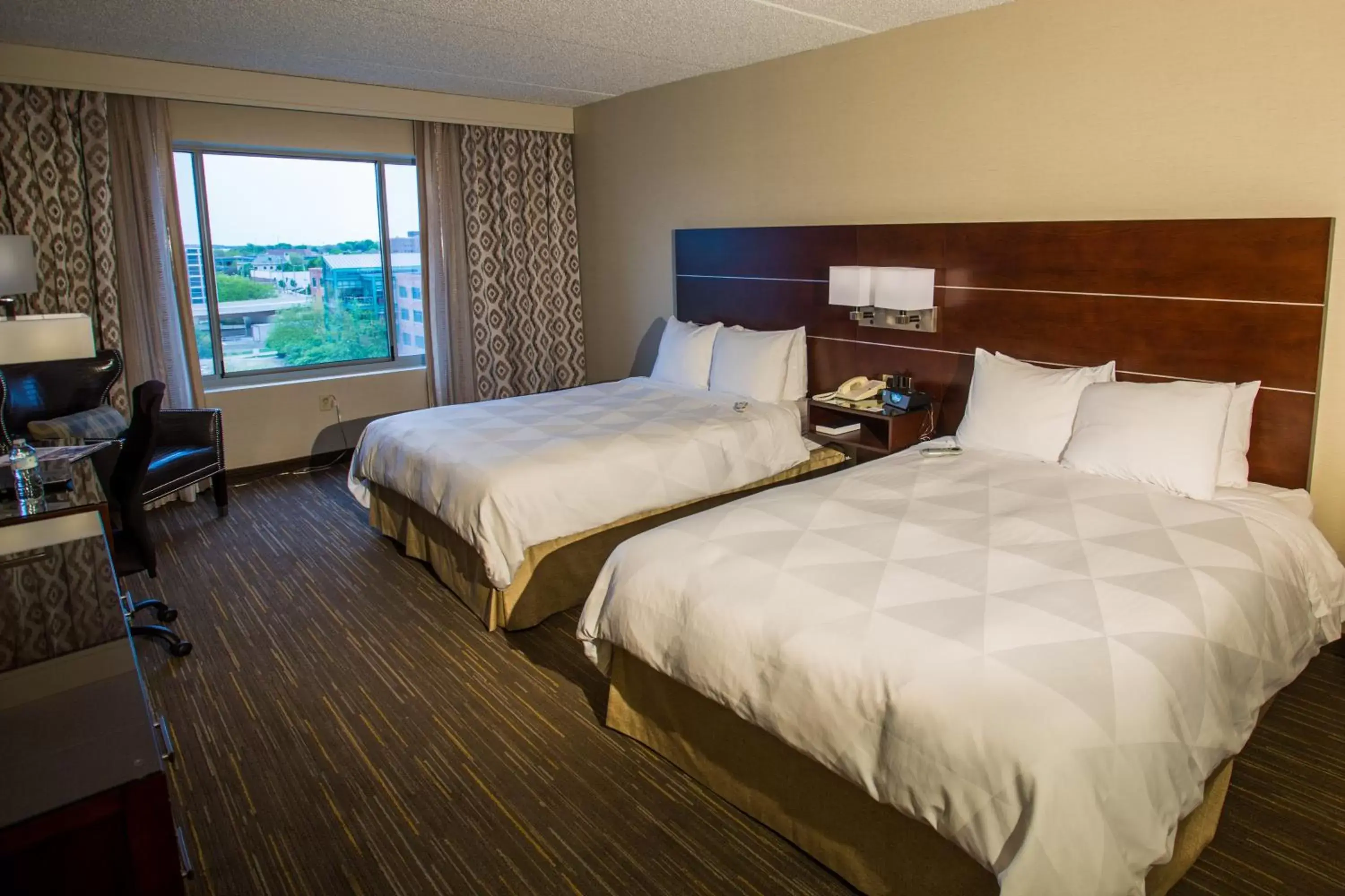 Photo of the whole room, Bed in Wyndham Moline on John Deere Commons