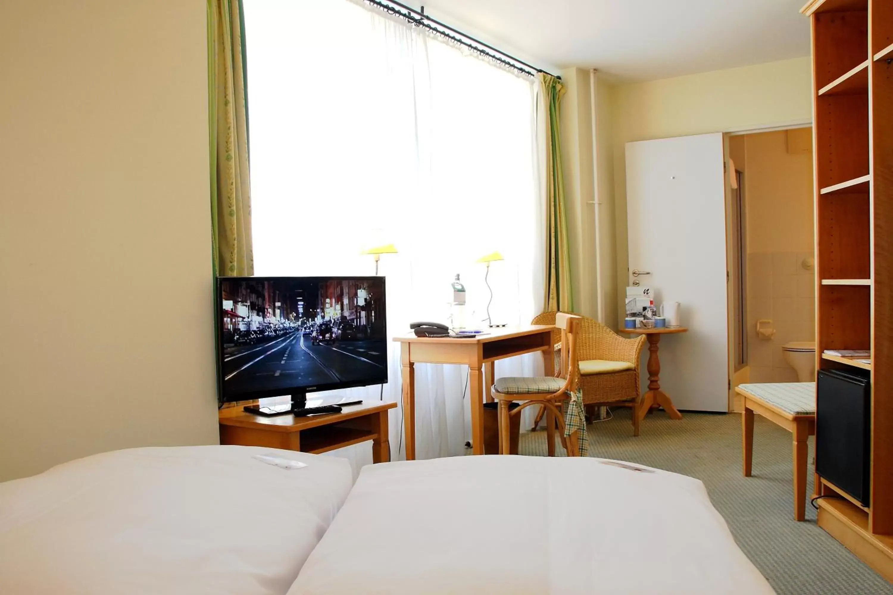 Photo of the whole room, Bed in Hotel Leipzig City Nord by Campanile
