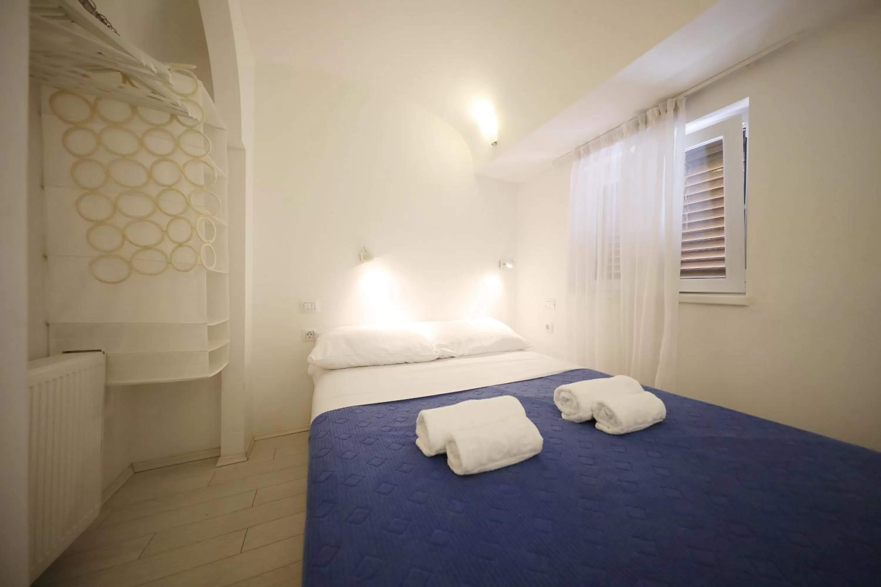 Bed in Central Apartments Integrated Hotel