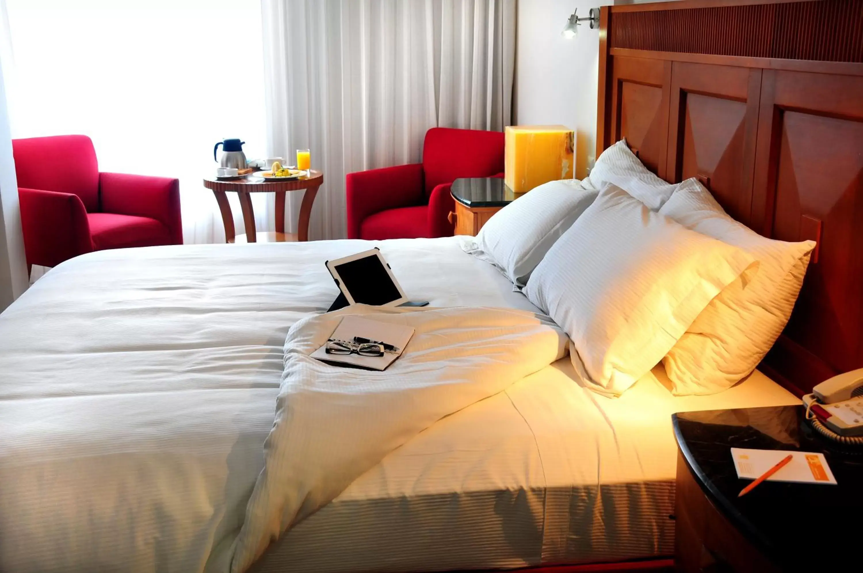 Bedroom, Bed in Ambiance Suites