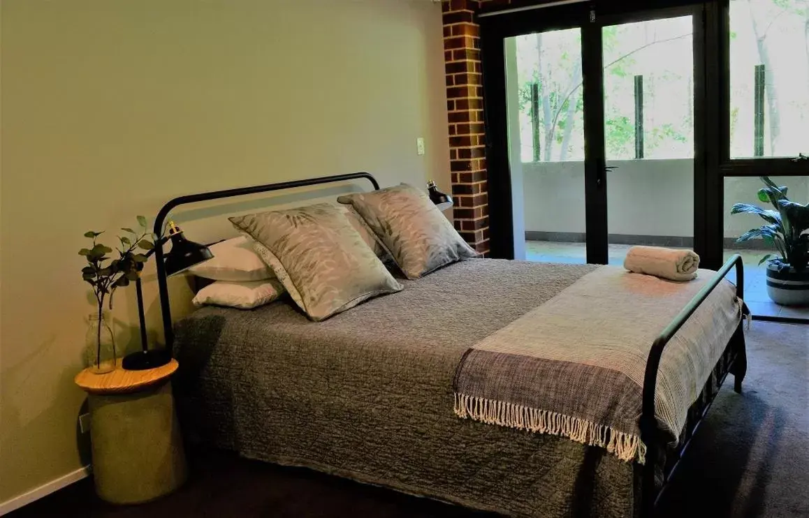 Bedroom, Bed in Byron Butter Factory Apartments