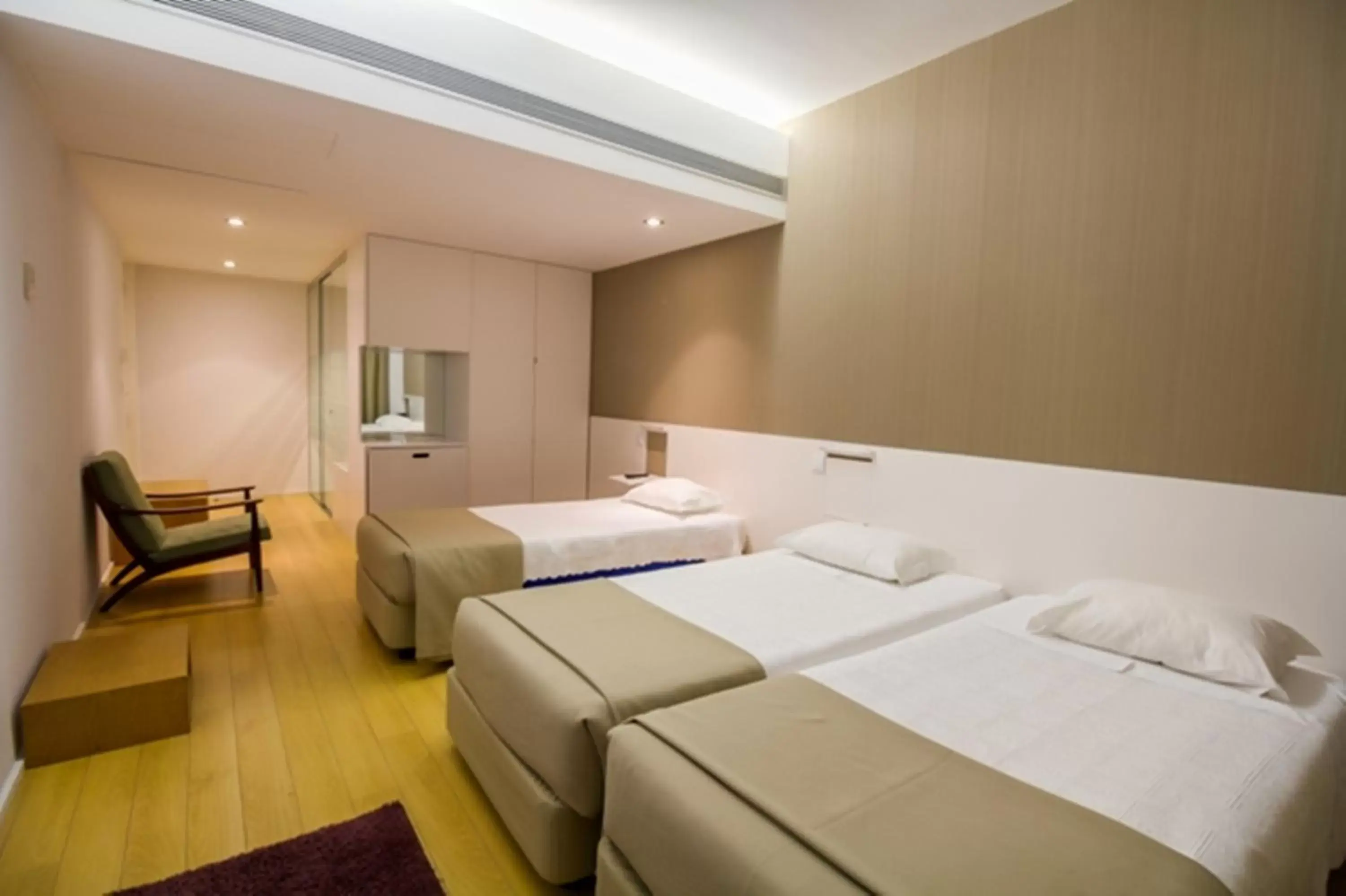 Bed in Hotel Laranjeira