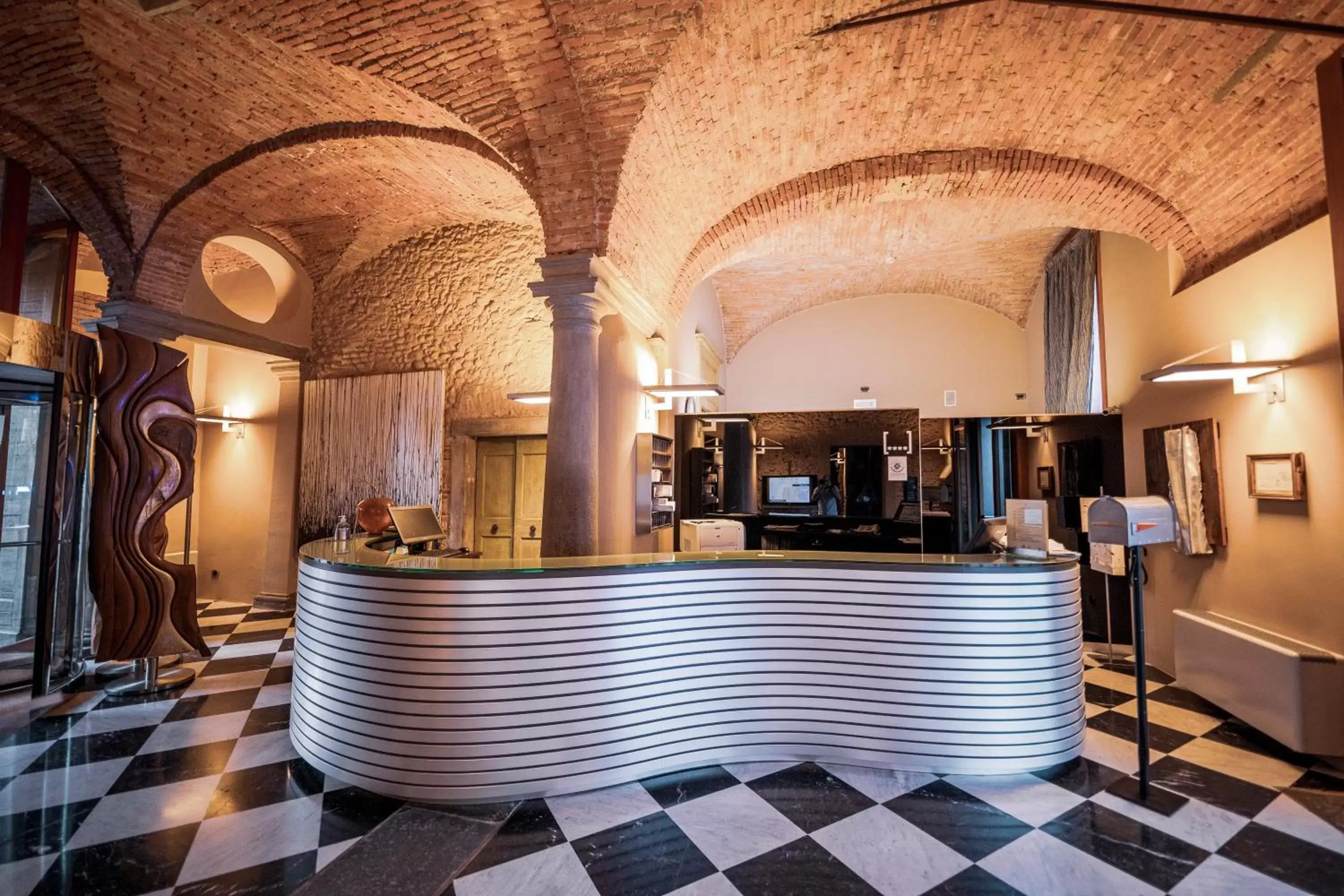 Lobby or reception in Settecento Hotel