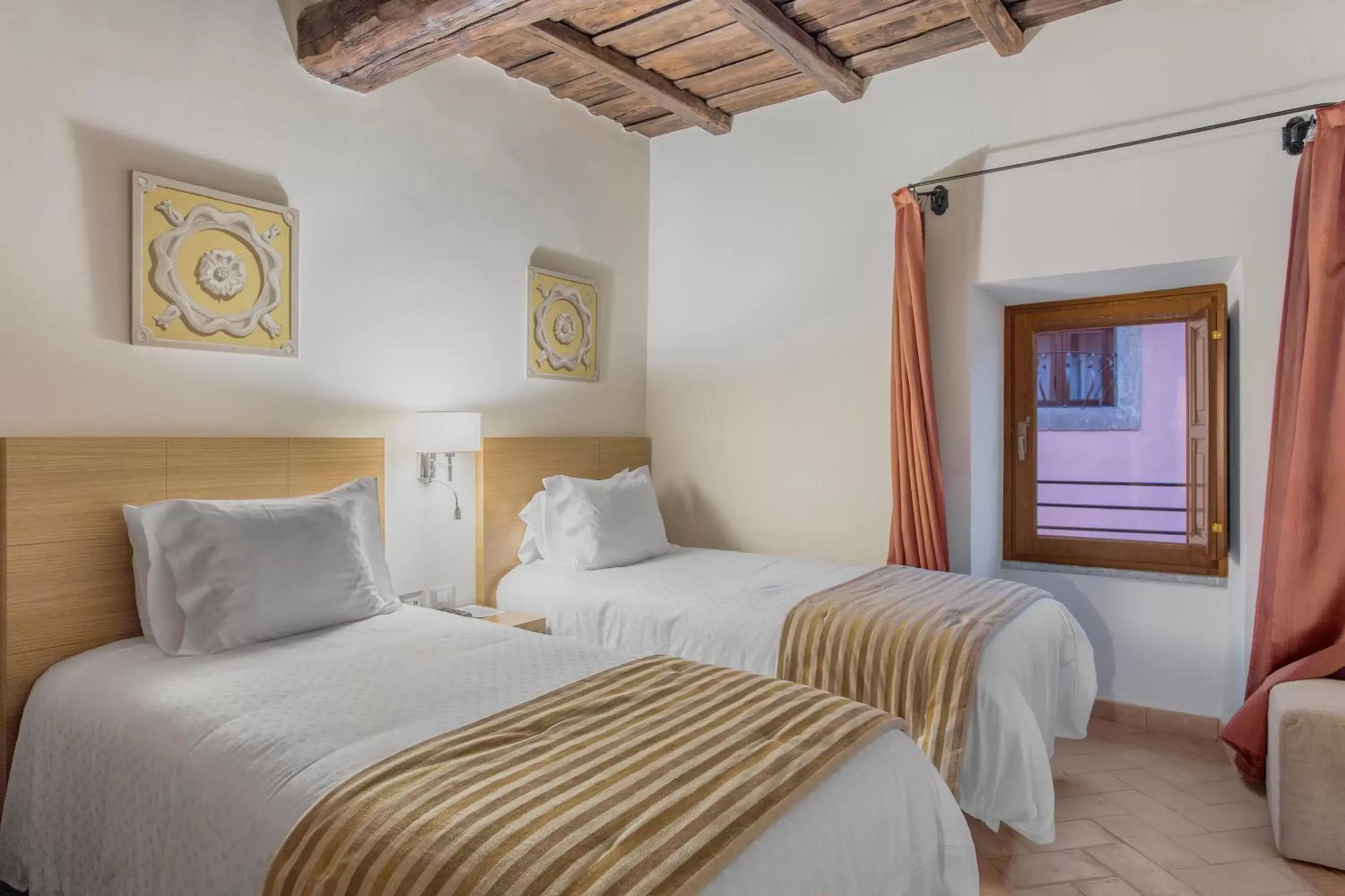 Bed in Palazzo Catalani Resort