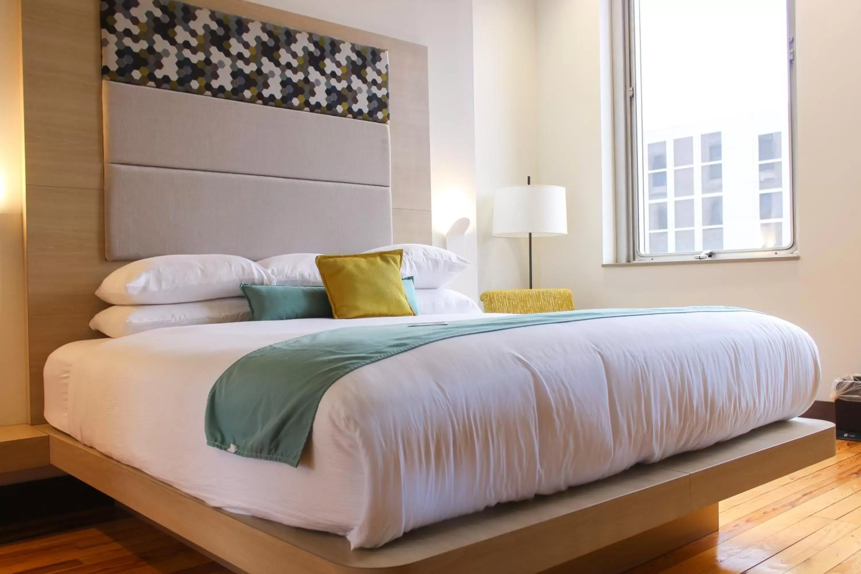 Bed in CityFlatsHotel - Grand Rapids, Ascend Hotel Collection