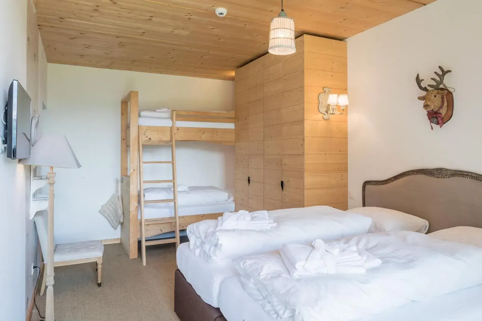 Bed in Rinderberg Swiss Alpine Lodge