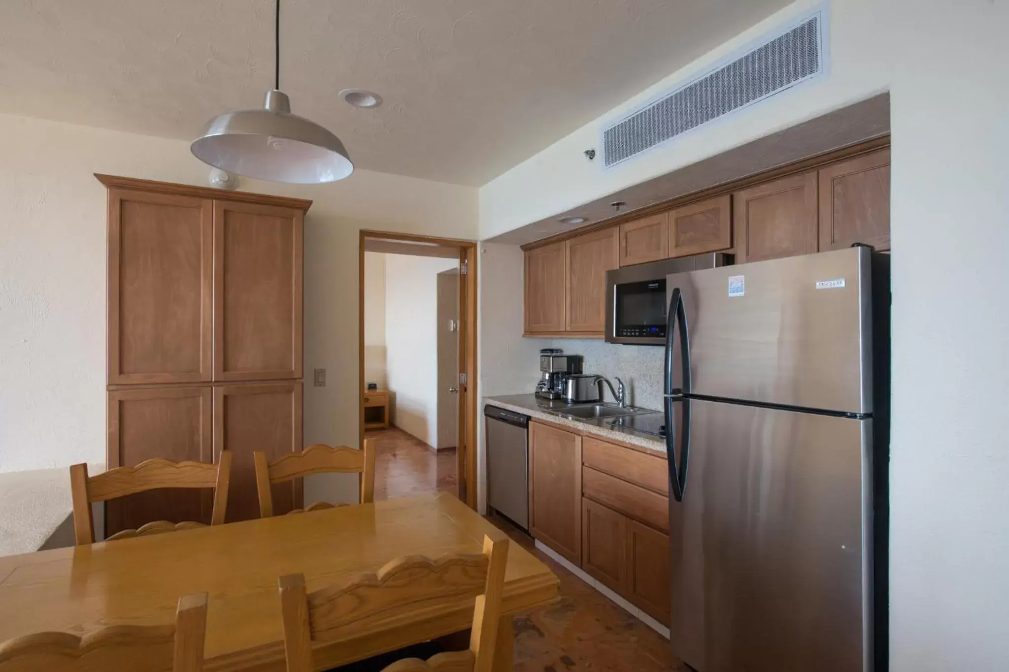 Dining area, Kitchen/Kitchenette in Club Regina Los Cabos