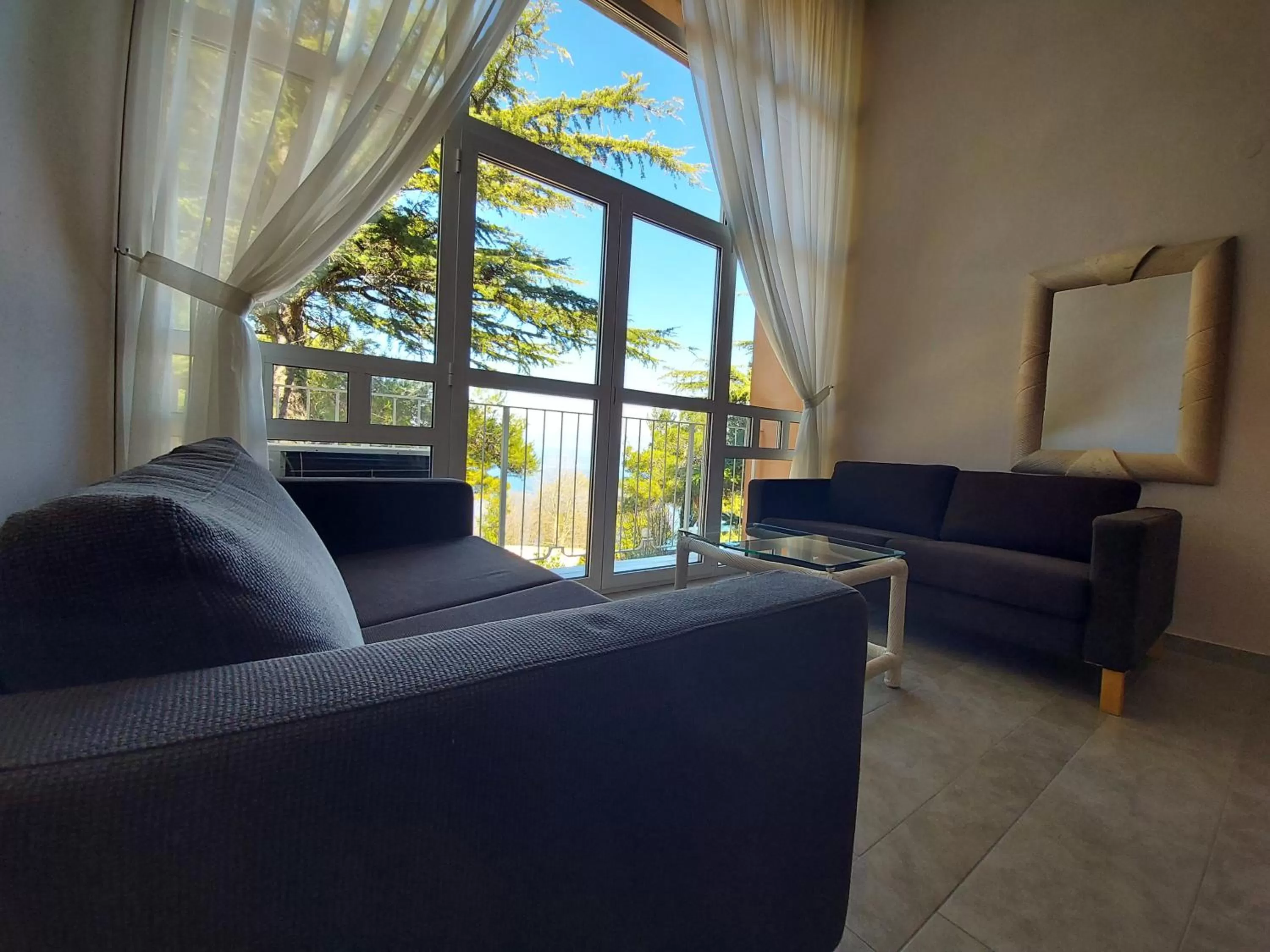 Communal lounge/ TV room in Belvedere Resort Hotels