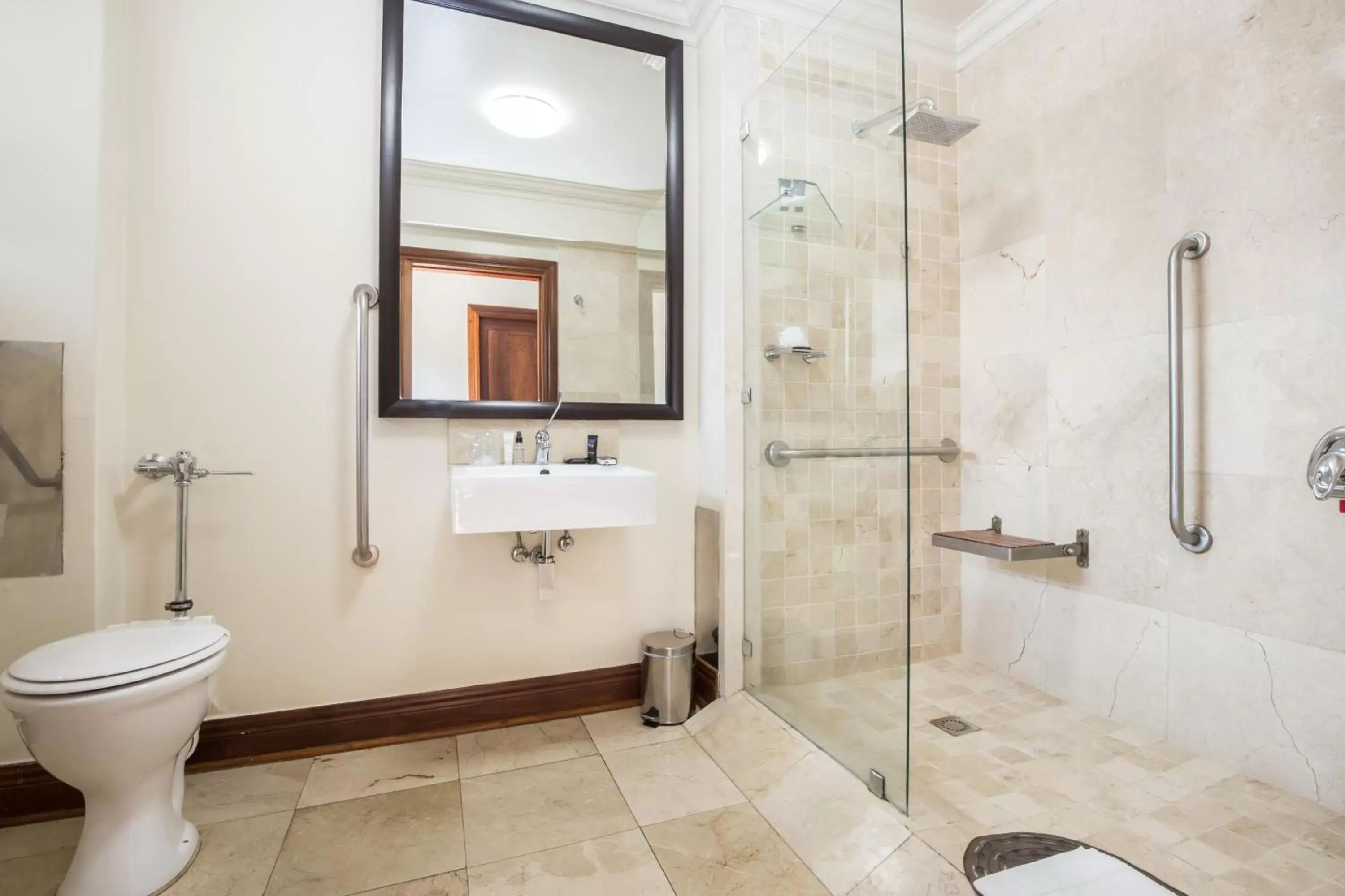 Bathroom in Belaire Suites Hotel