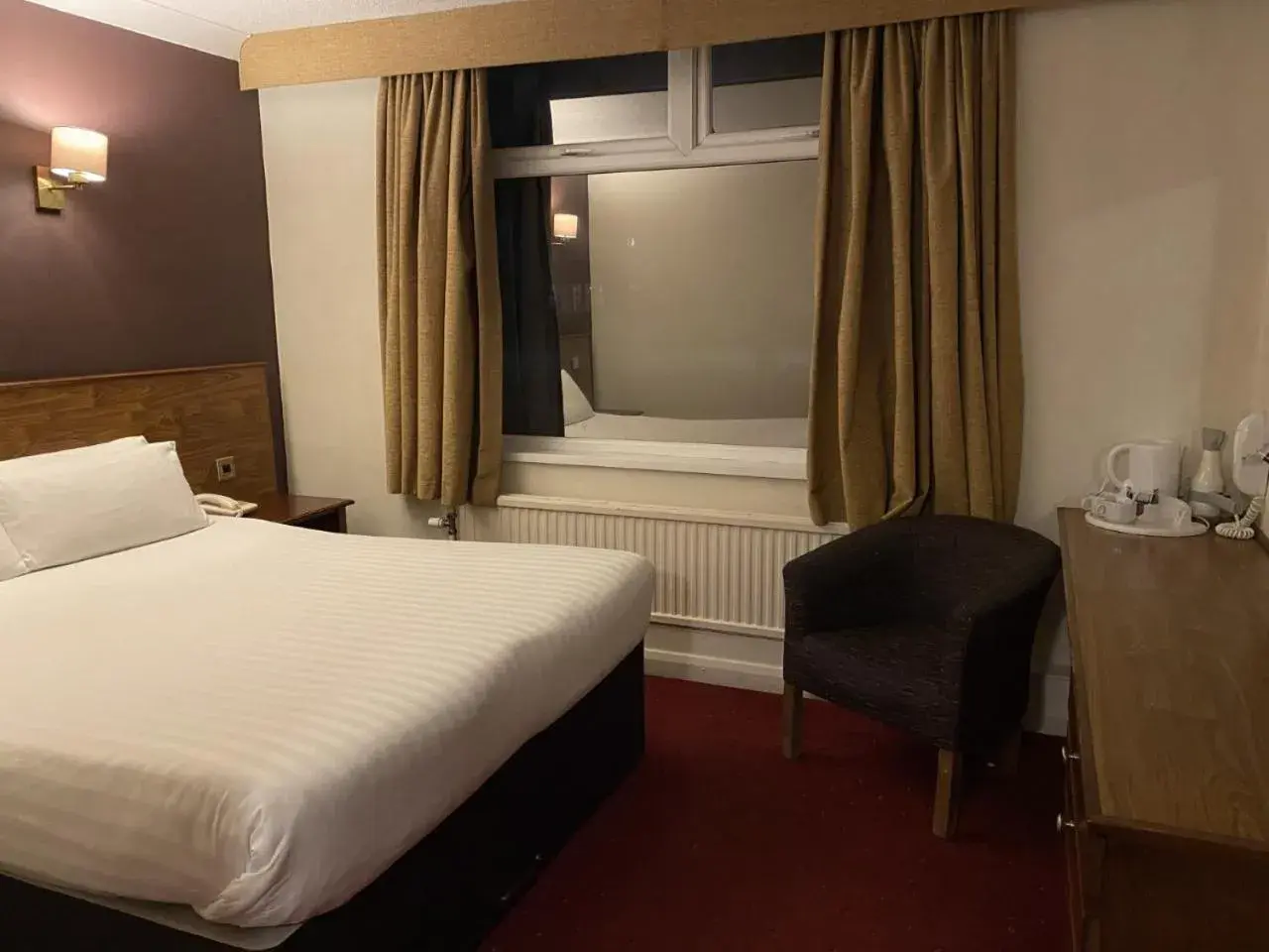 Bedroom, Bed in The Greyhound Hotel Bedroom, Bed in The Greyhound Hotel