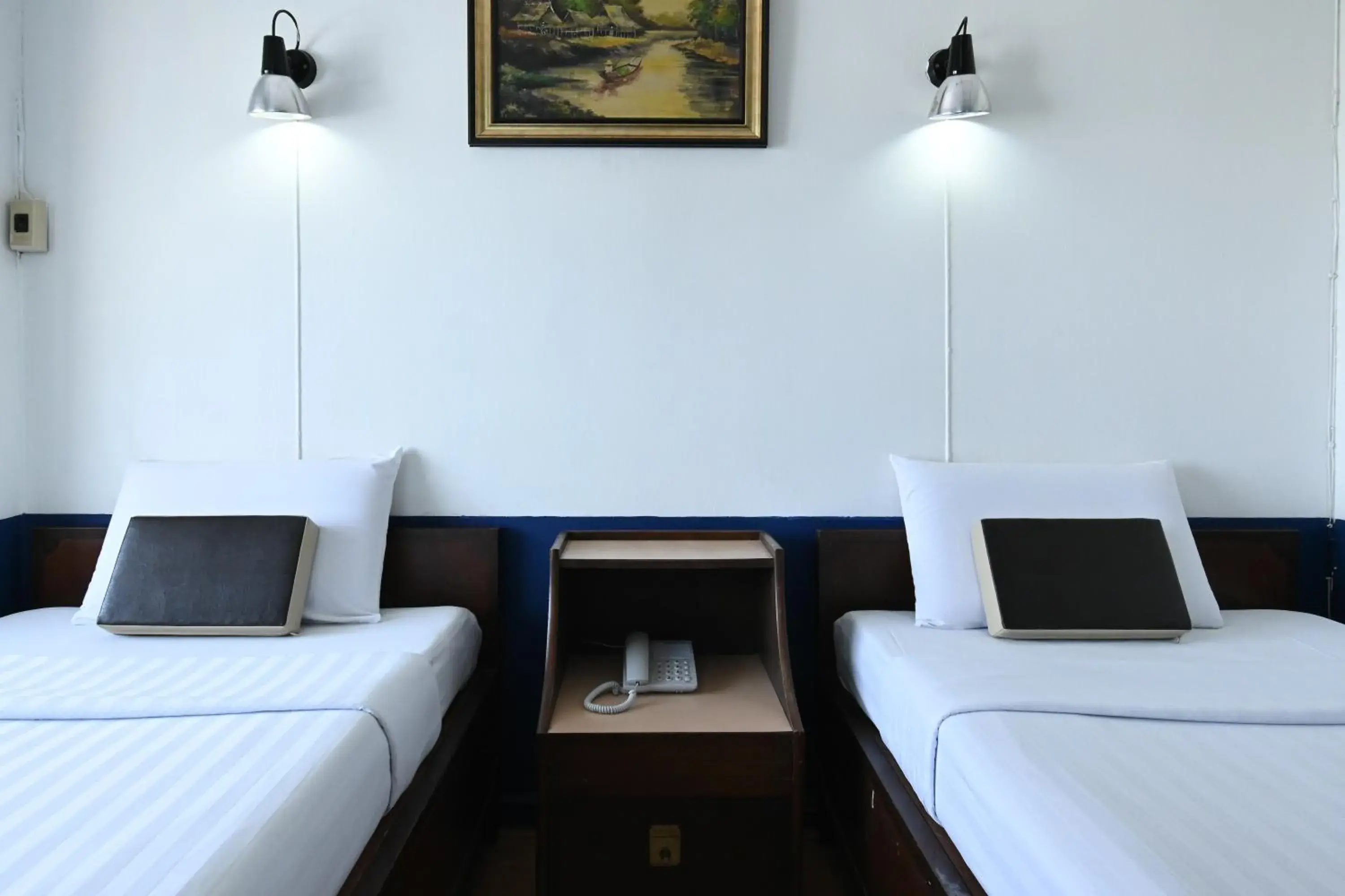Bed in The Krungkasem Srikrung Hotel