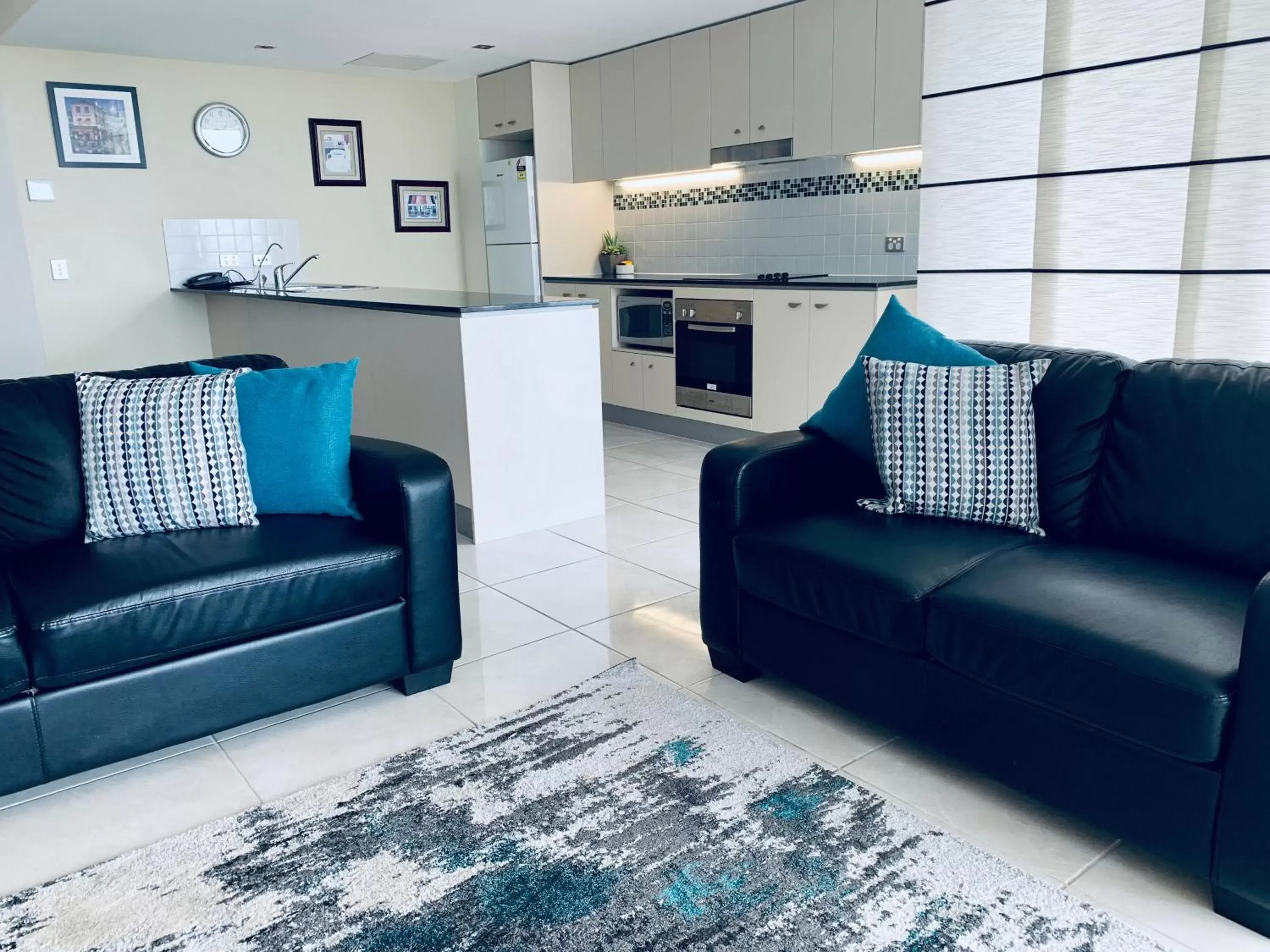 Kitchen or kitchenette, Seating Area in Ocean Views Resort Caloundra