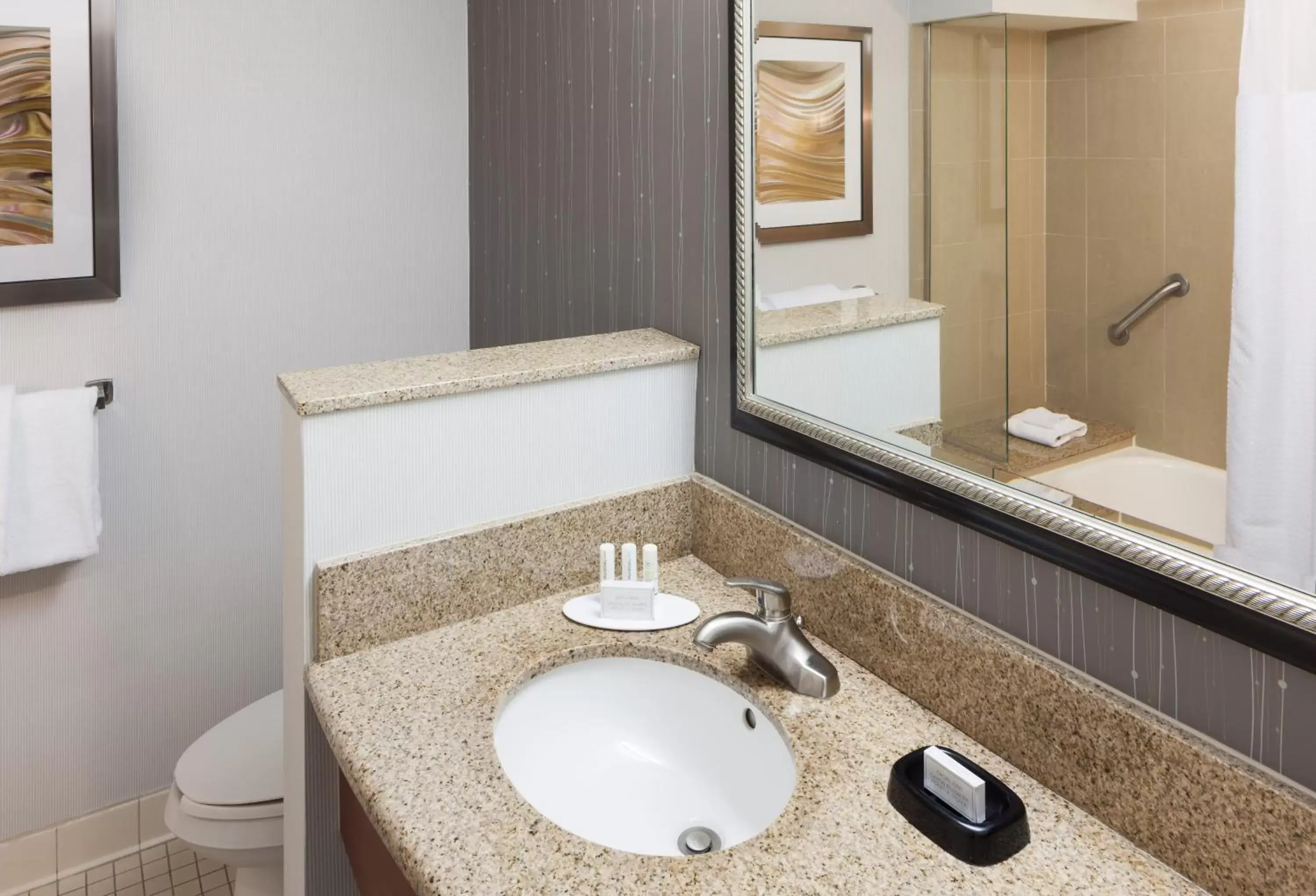 Bathroom in Courtyard by Marriott Miami at Dolphin Mall