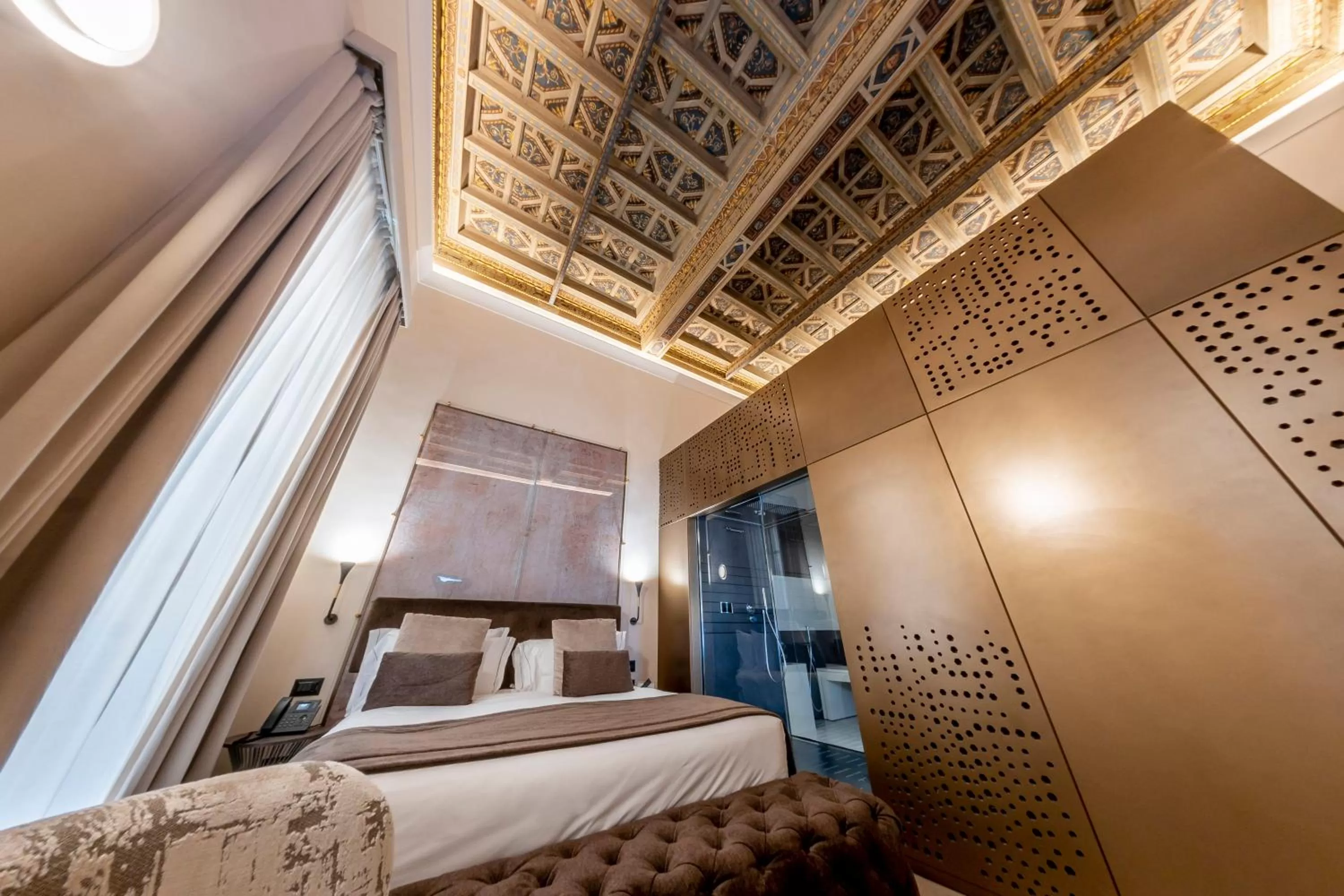 Bed in Martius Private Suites Hotel