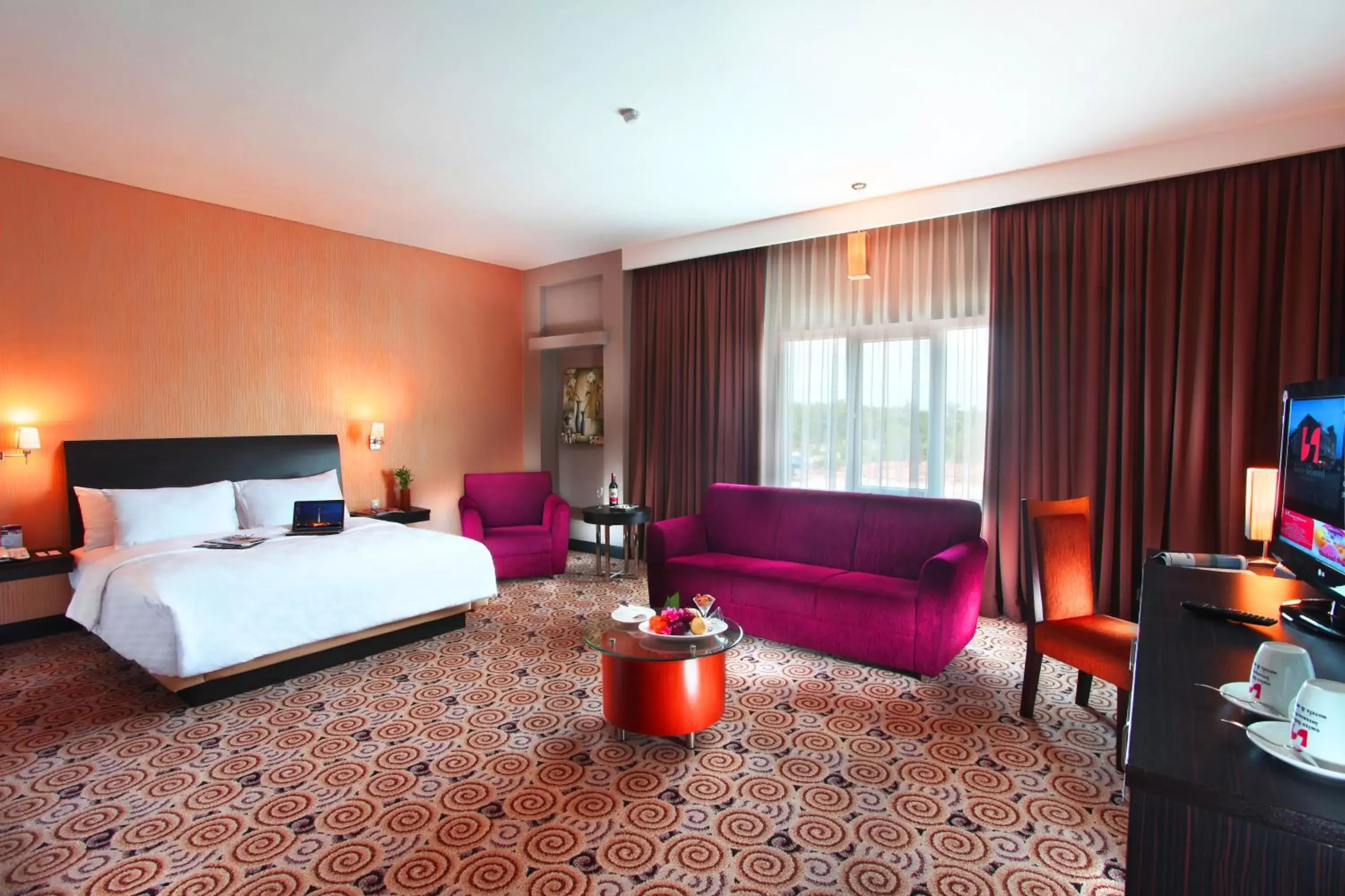 Bedroom in Swiss-Belhotel Kendari