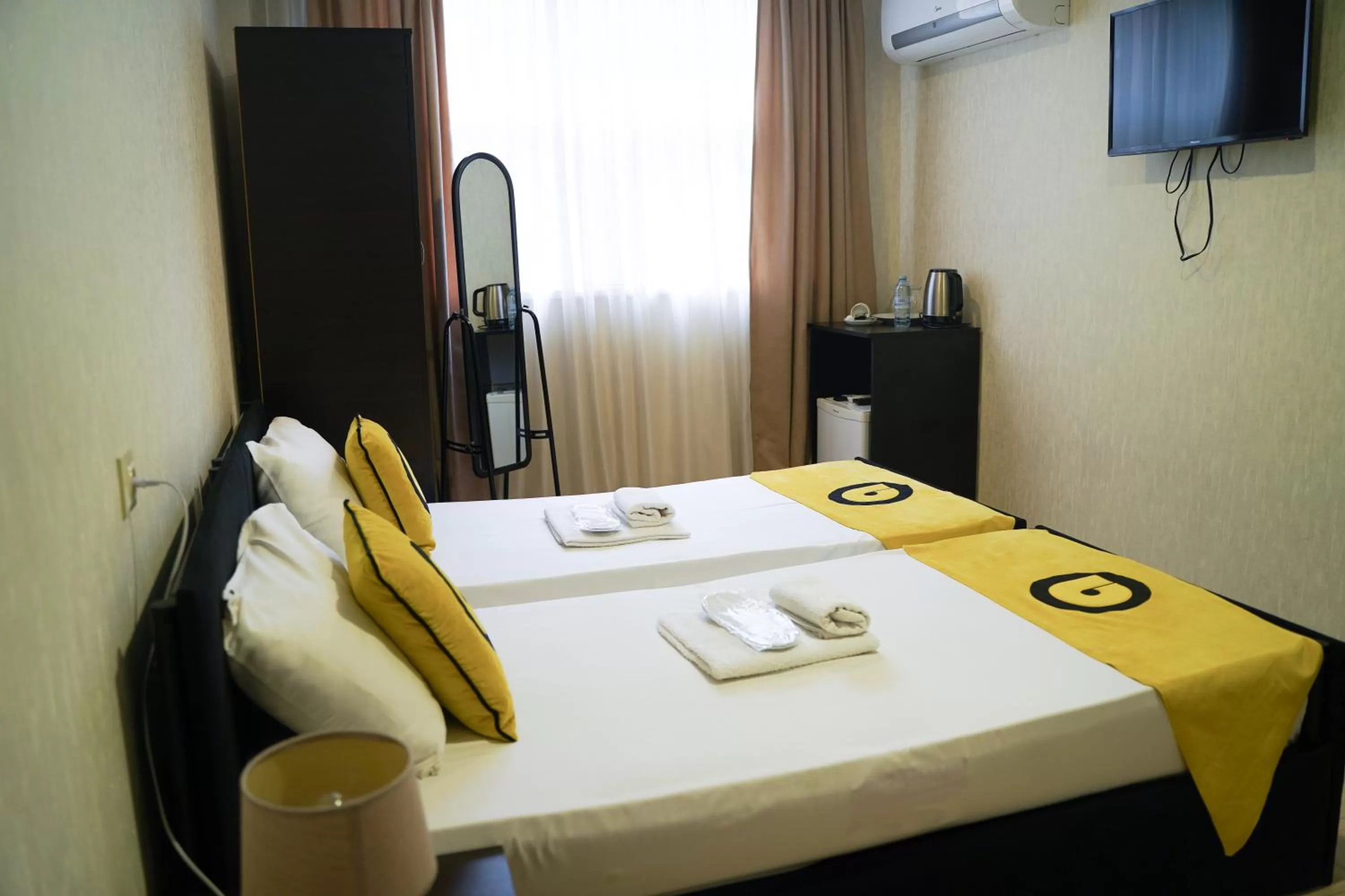 Photo of the whole room, Bed in Aura Plaza Hotel