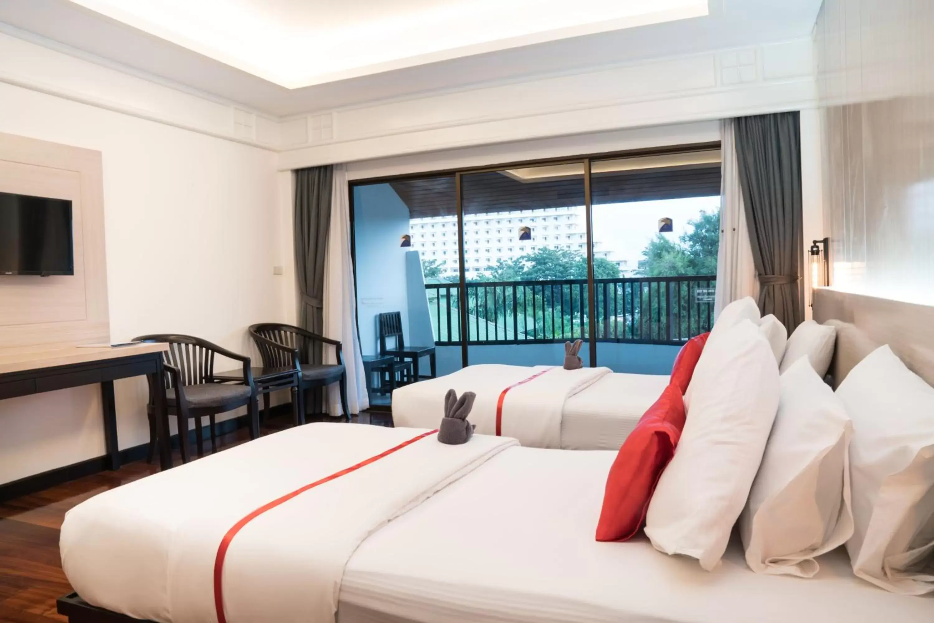 Bed in Grand Jomtien Palace Hotel - SHA Extra Plus