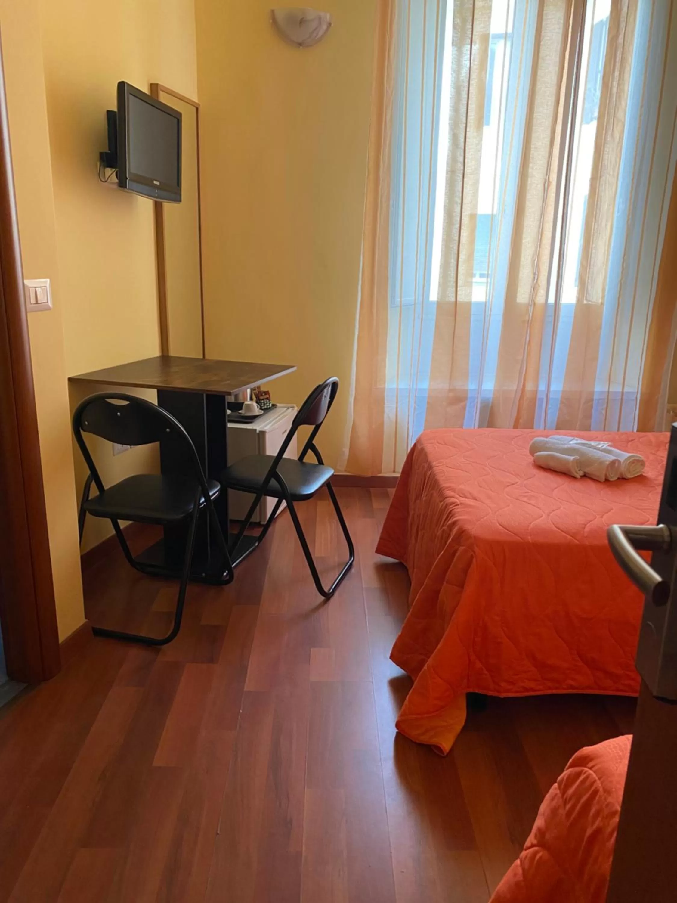 Bed in AmareRomaRooms