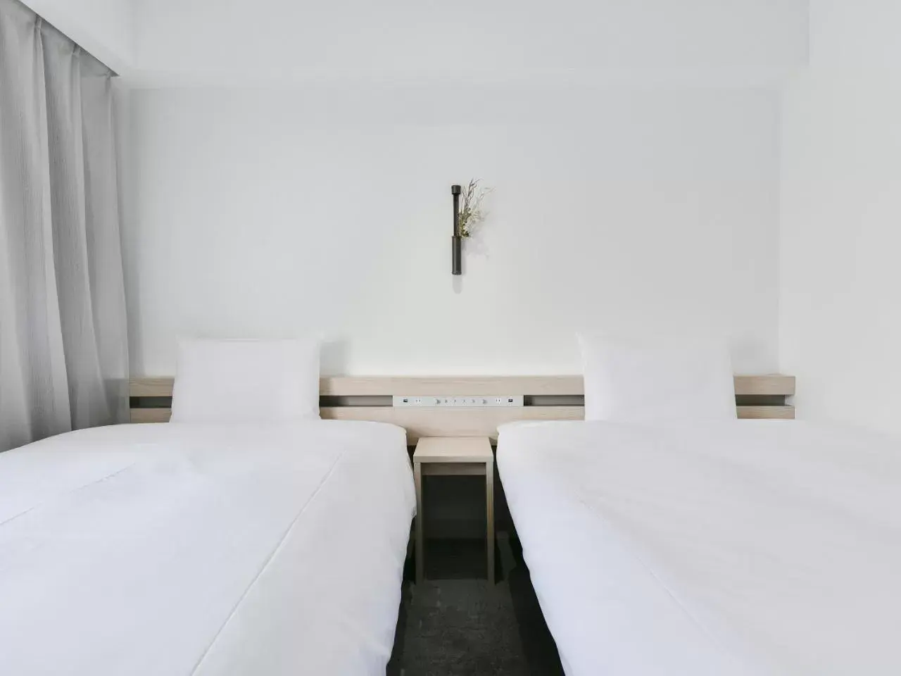 Bed in REF Kumamoto by VESSEL HOTELS