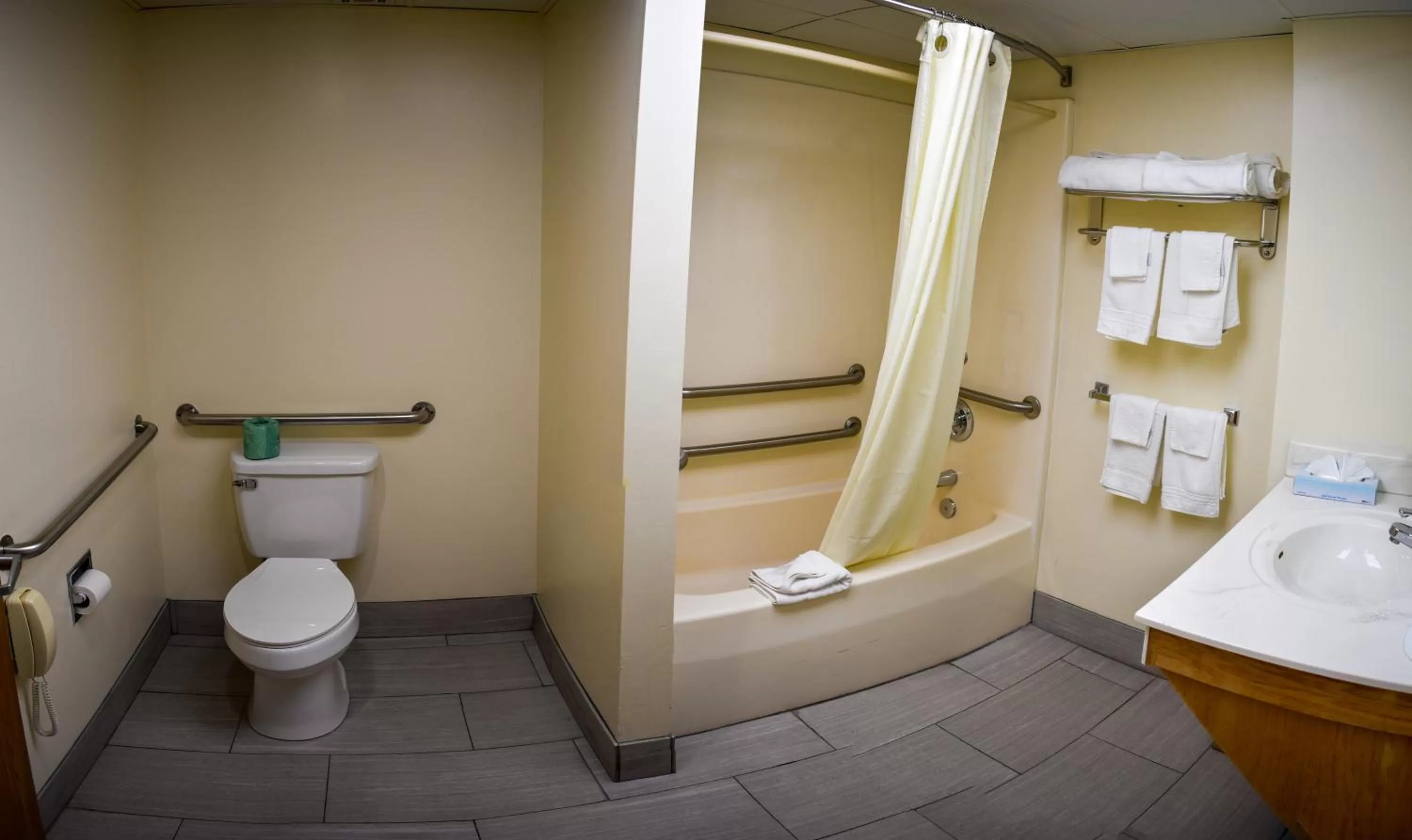 Bathroom in Super 8 by Wyndham Branson By Andy Williams Theatre