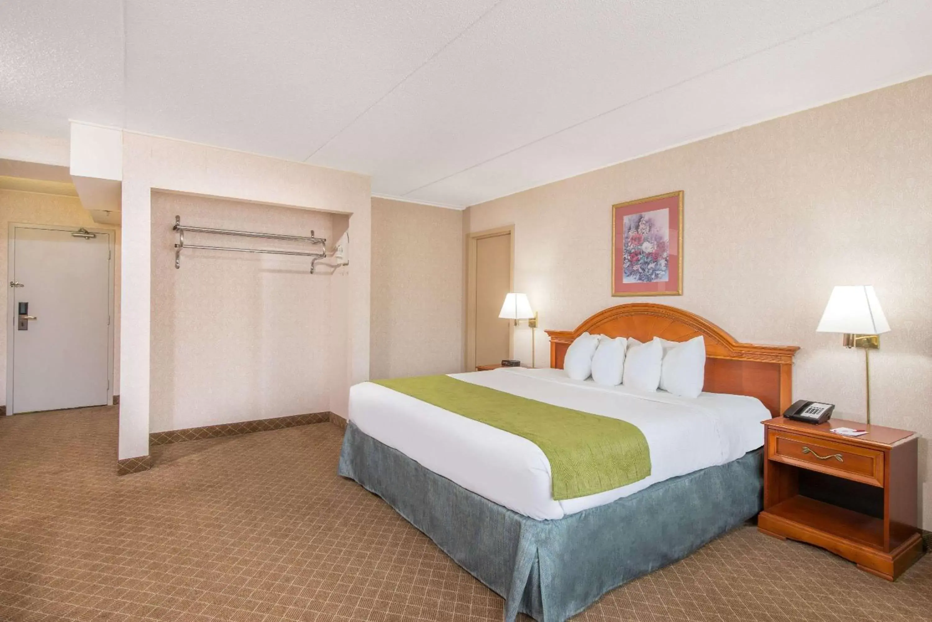 Photo of the whole room, Bed in Ramada by Wyndham Cumberland Downtown